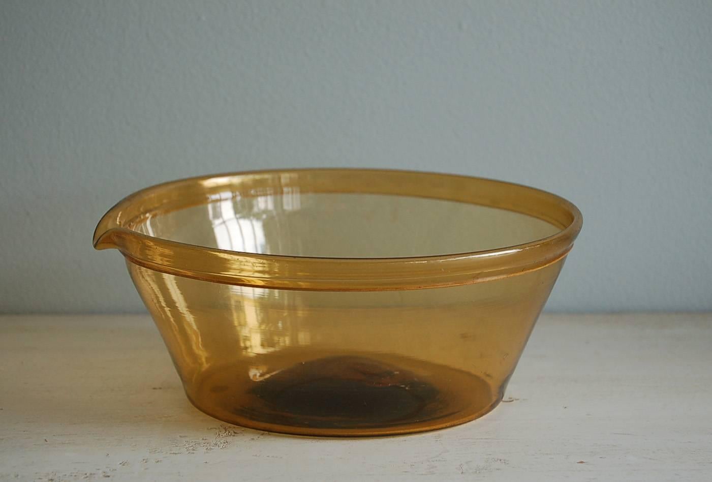 Swedish yellow 18th century Gustavian handblown glass milk bowl with pouring spout, circa 1780, origin: Sweden.