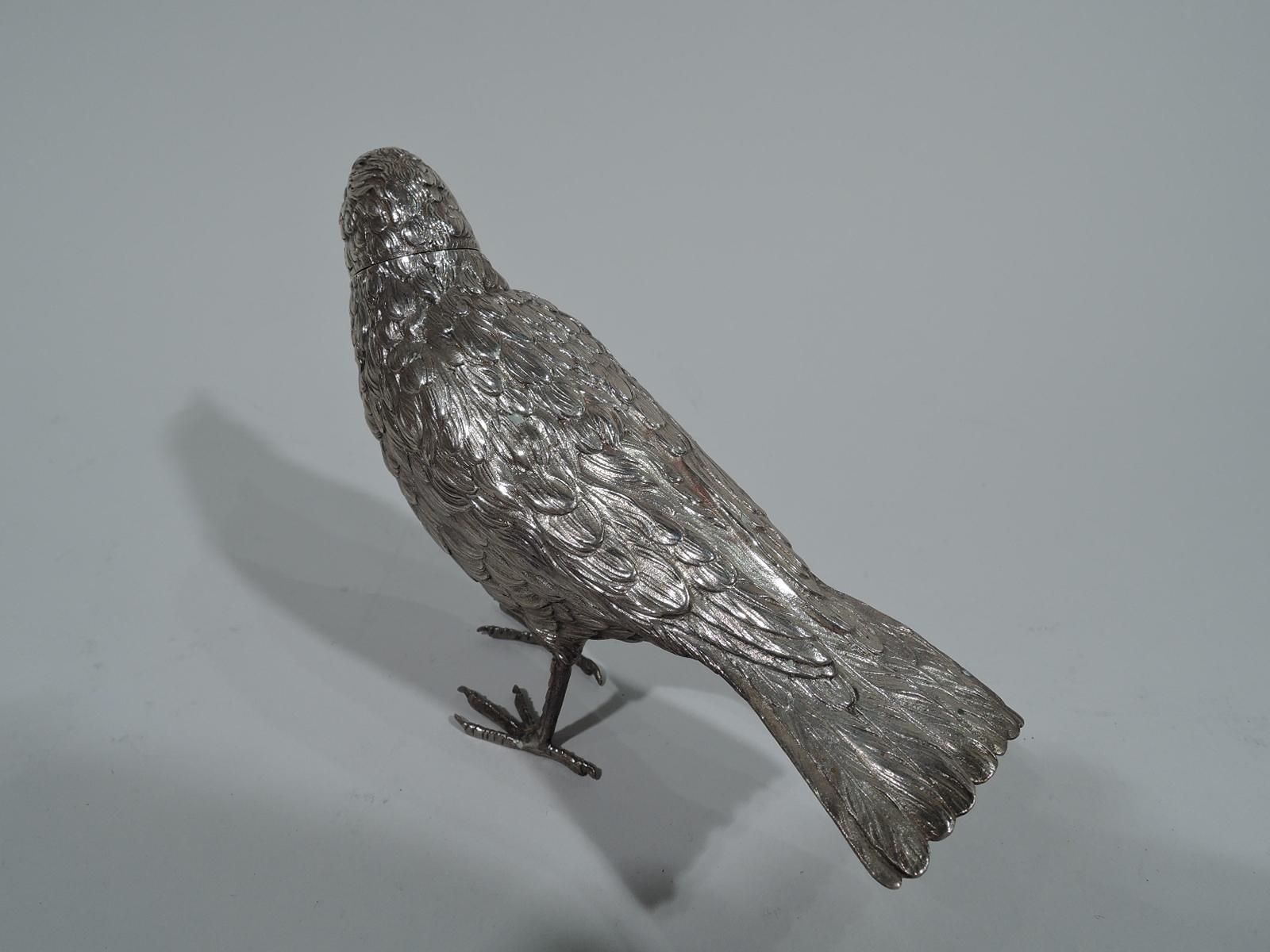 small silver bird