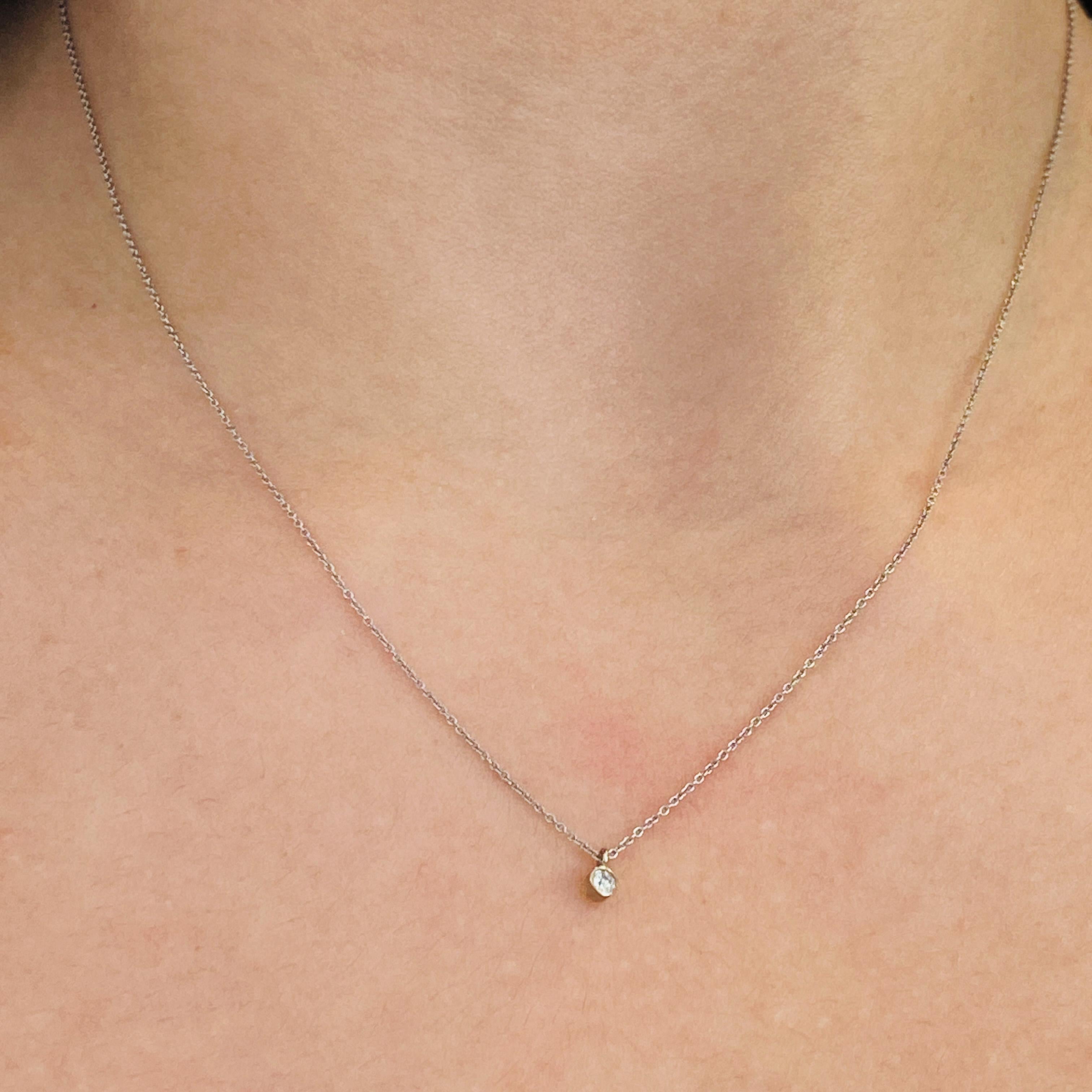 This adorable diamond solitaire necklace is a perfect everyday accent around the neck! At 16 inches long, it's easy to stack this necklace with other favorite chains and pendants. The clean and bright white gold and bright diamond are perfect for a