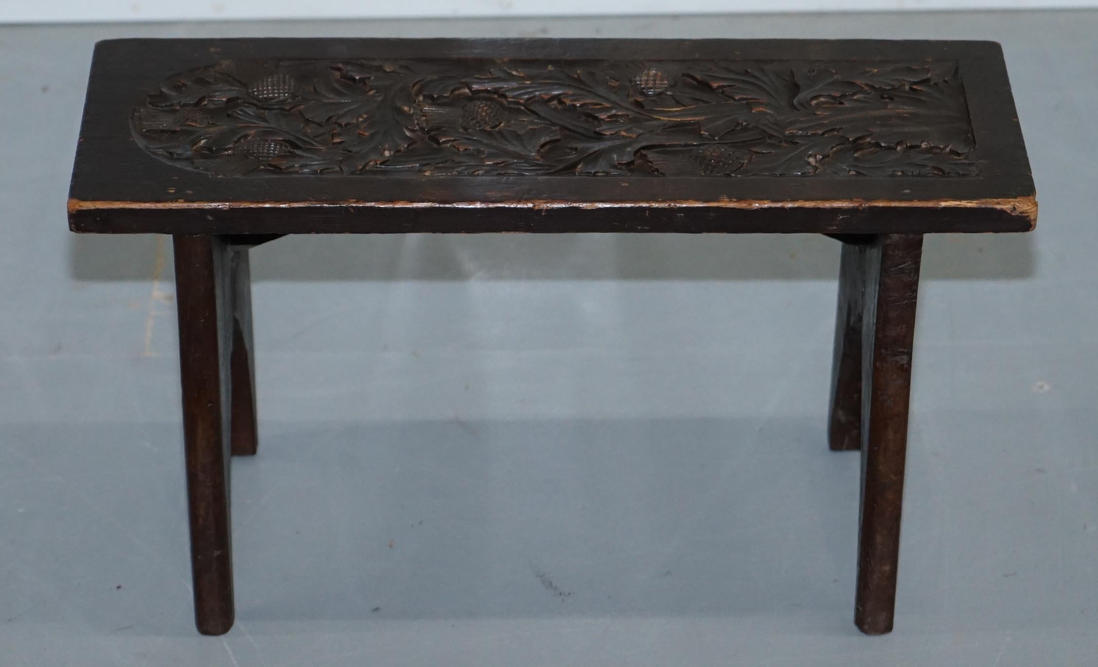 We are delighted to offer for sale this lovely little Liberty’s London hand-carved side table

A very good looking and well-made piece, ideally suited to sit beside a chair or sofa and used as a drinks table, that said its so decorative and well