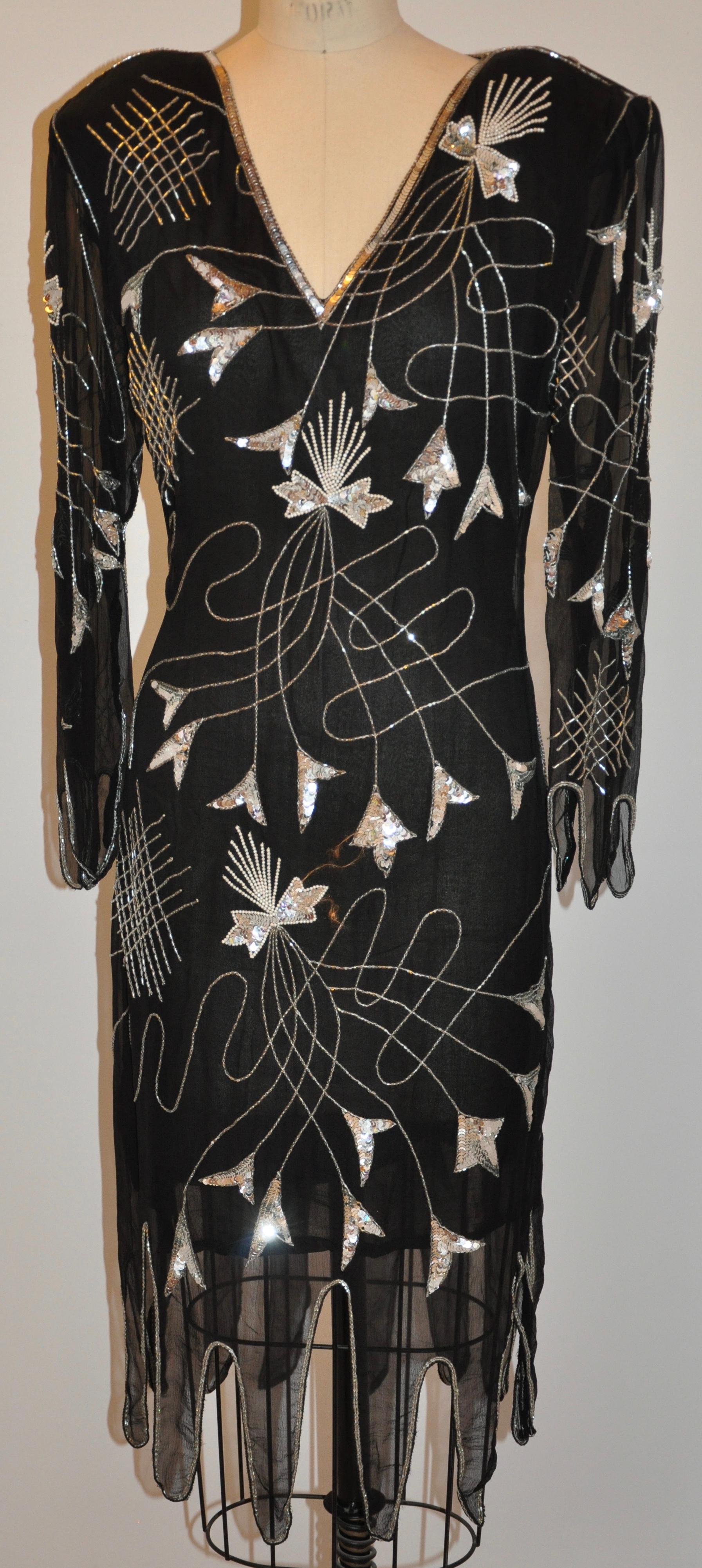        Sweet Lo Iconic 1970s double layered black chiffon with scallop hemline and sleeves beaded evening dress measures 46 inches in length. Shoulders measures 18 inches across, neck-to-sleeve is 4 1/2 inches, sleeves are 24 inches accented with