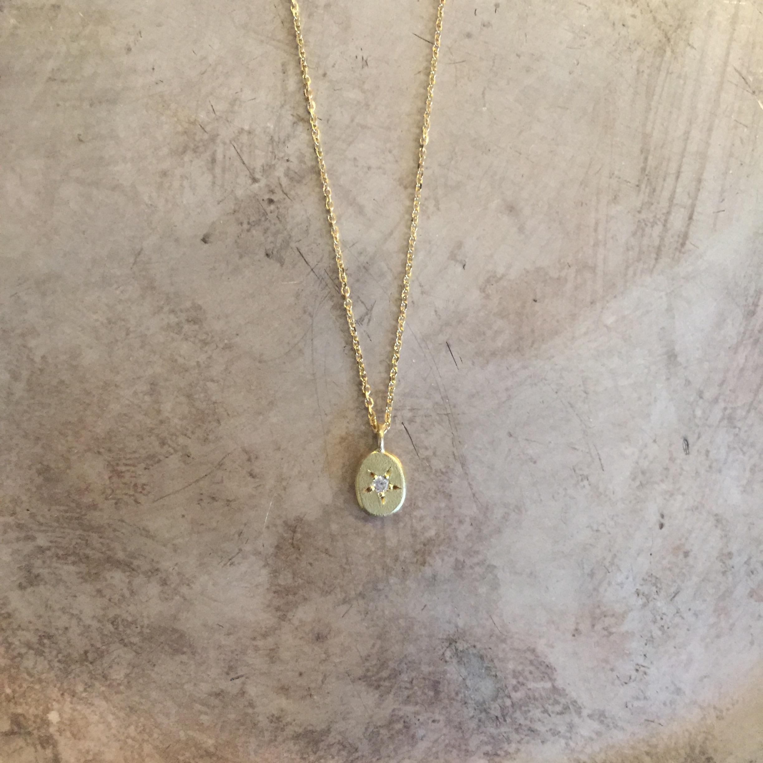 This classic piece from Sweet Pea's popular Starry Starry Night collection is simply timeless. Made from 18k yellow gold fine diamond cut chain this necklace is 63.5cm long with a sparking diamond set star pebble drop pendant. The oval 6mmx4mm