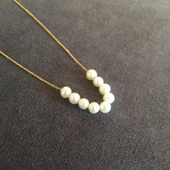Sweet Pea 18 Karat Yellow Gold Sliding White Pearl Abacus Necklace