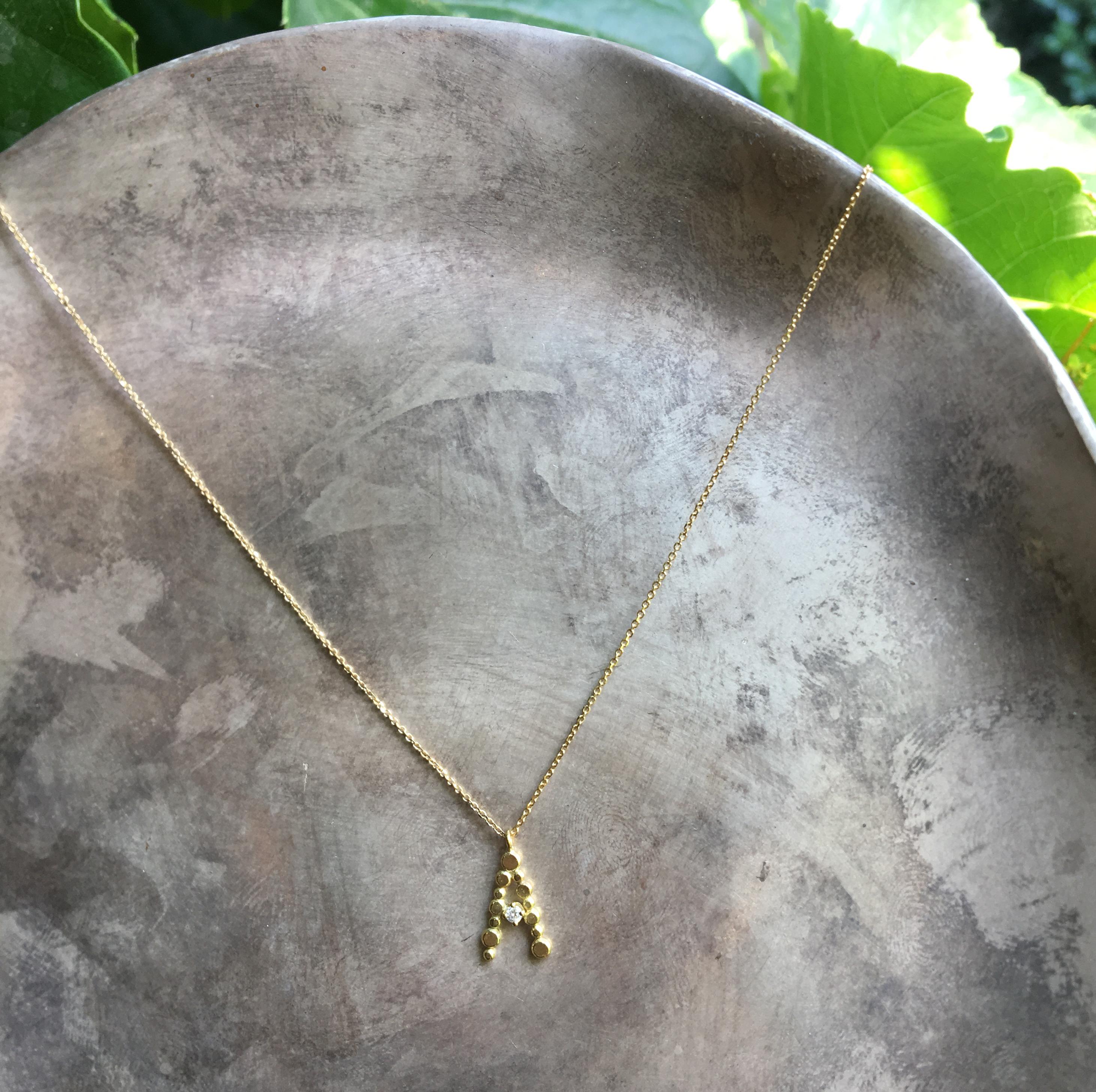 Contemporary Sweet Pea Diamond and 18 Karat Yellow Gold Initial Letter 'A' Charm Necklace For Sale
