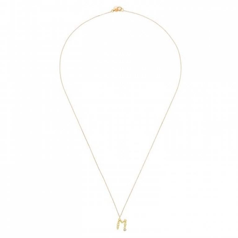 These beautiful charm necklaces are from Sweet Pea's new 'Love Letters' collection, with each letter made from 18k yellow gold and threaded onto a fine chain. The handmade pendant is approximately 10-12mm tall and comprises small gold discs