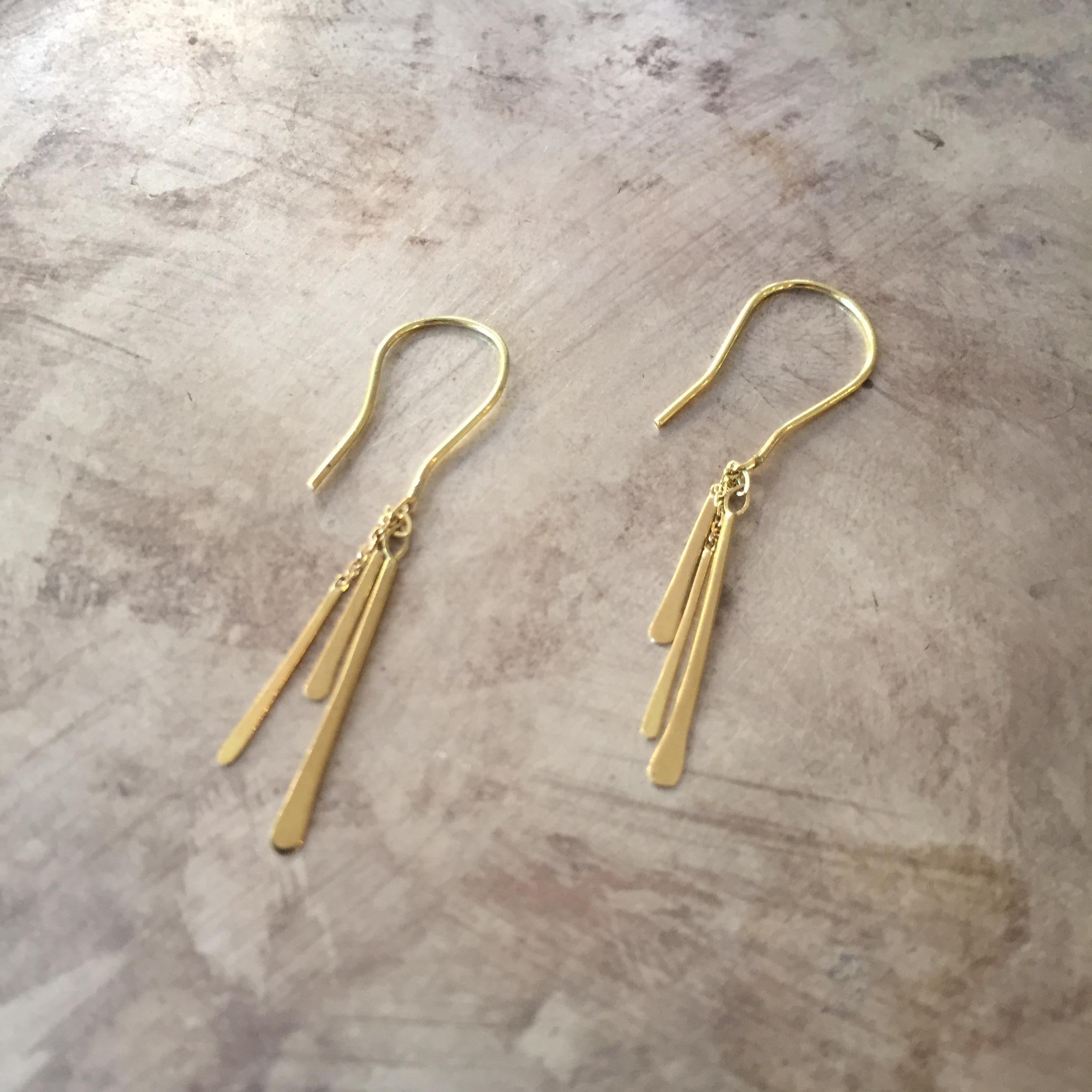 Handmade from 18k yellow gold, these super cute hook earrings are 3cm long overall. They have 3 varying length fine gold bars which move playfully and are an easy-to-wear timeless addition to any outfit, day or night! 