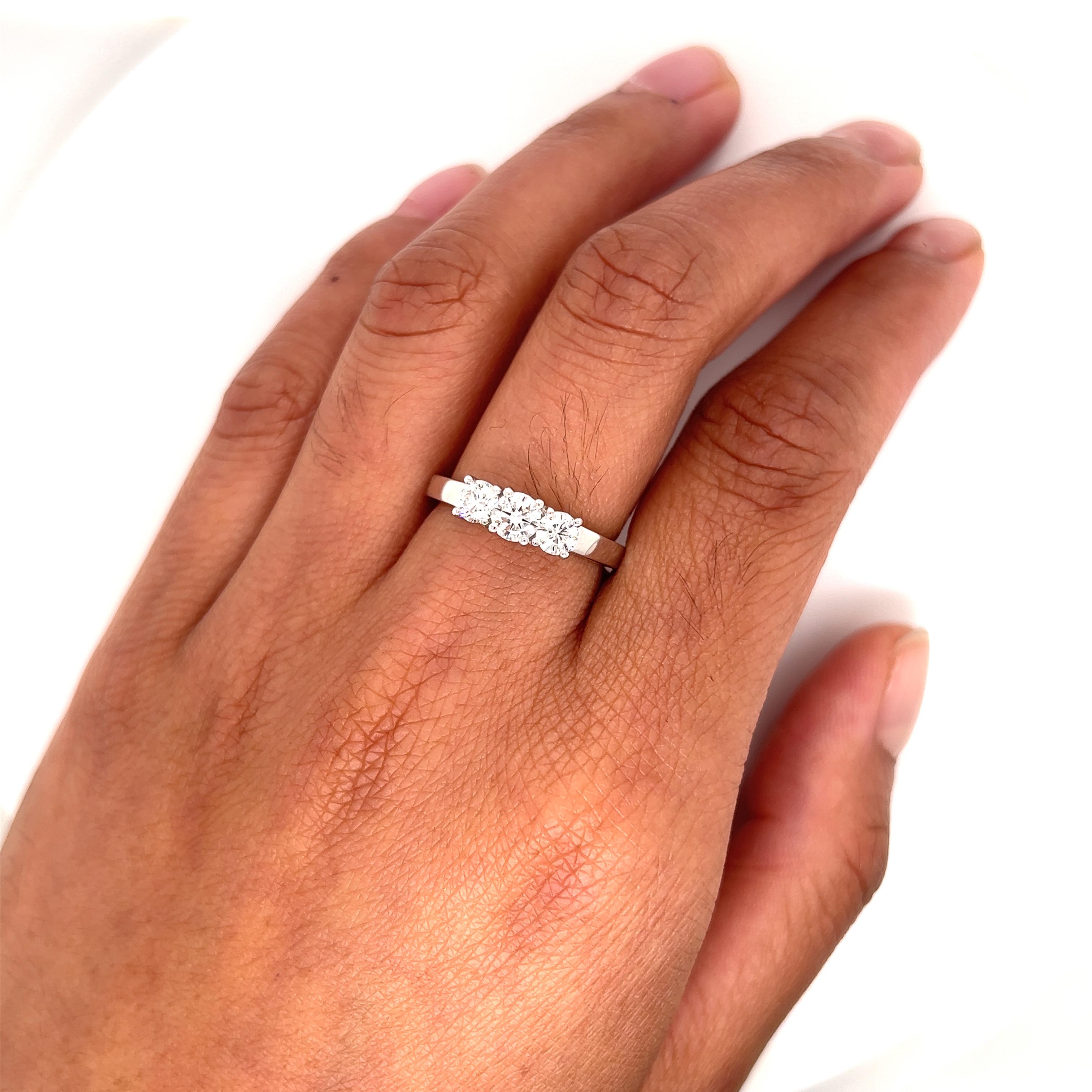 Women's 0.92 Carat Sweet Three Stone Diamond Ring  For Sale