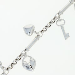 Sweetheart Charm Bracelet, 14 Karat White Gold Hearts Skeleton Keys Rolo