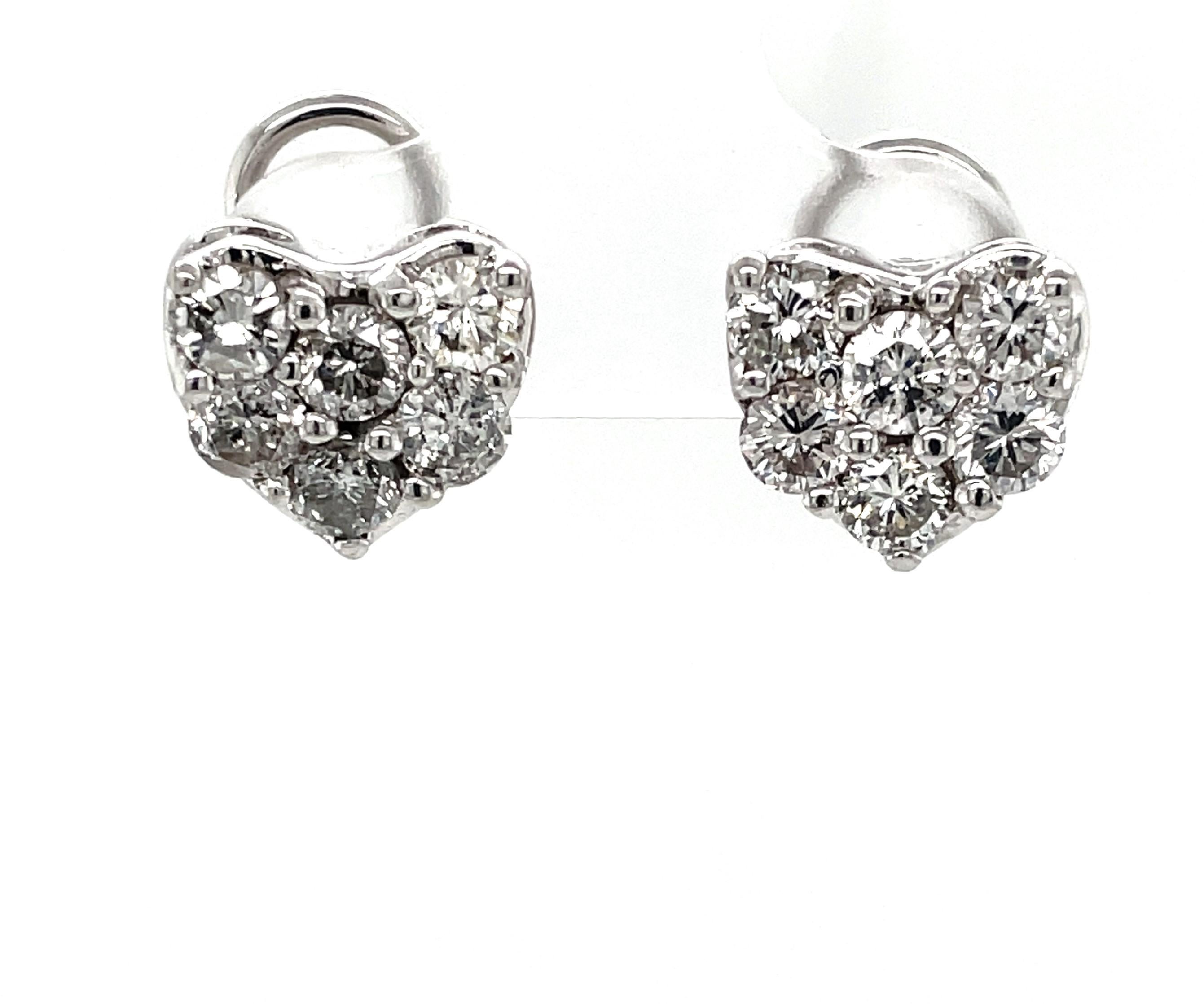 Adorable heart-shaped 14 karat white gold earrings with over one carat of diamonds is a great way to say 