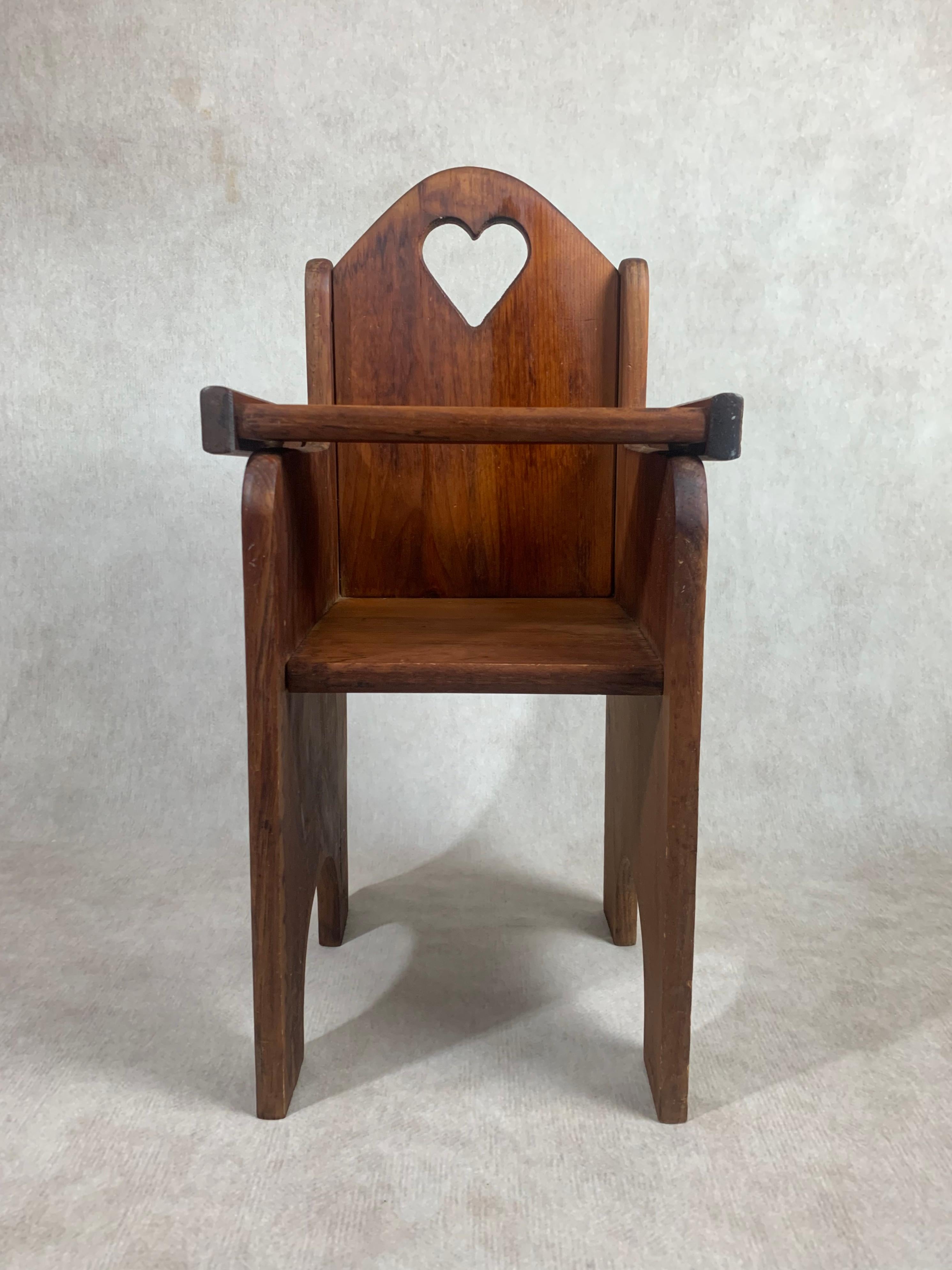 Heirloom quality solid wood doll highchair handmade in Lancaster, PA circa 1940 of native pine.  Tray moves easily upon raising and lowering. Legs are sturdy and presents beautifully overall. Only minor scratches observed commensurate with age and