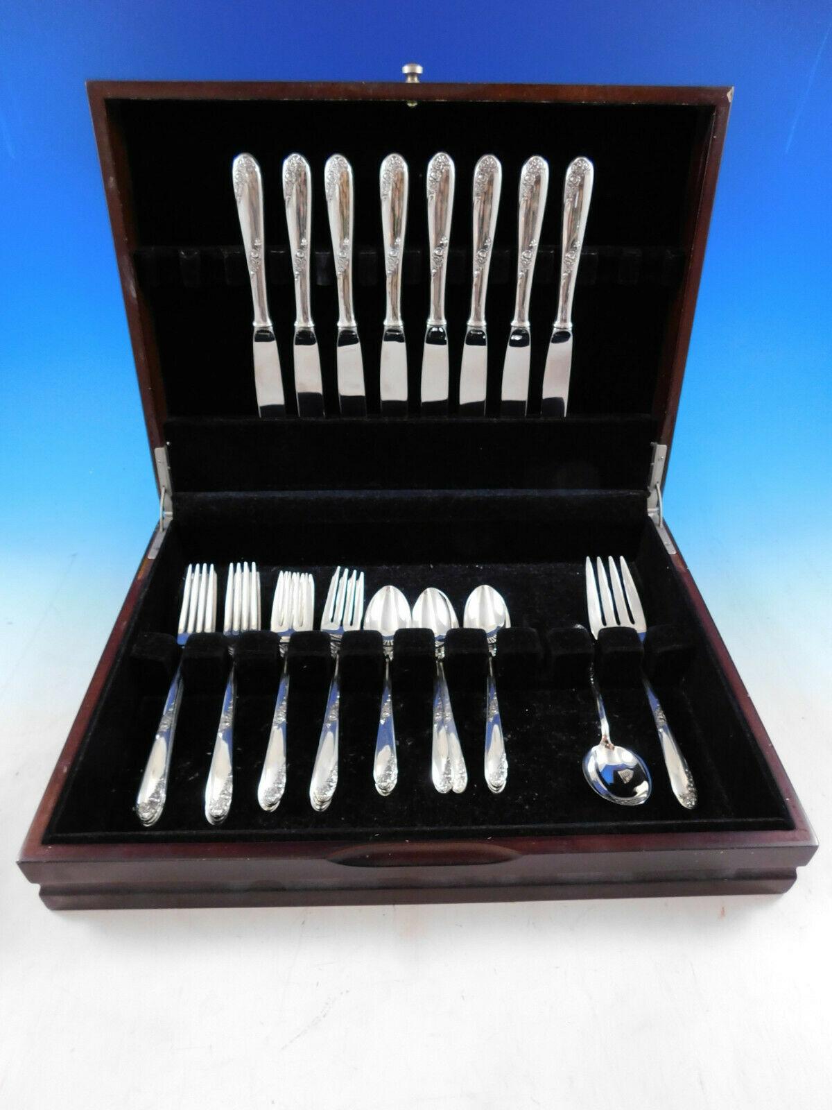 Sweetheart rose by Lunt sterling silver flatware set, 34 pieces. This set includes:

8 knives, 9