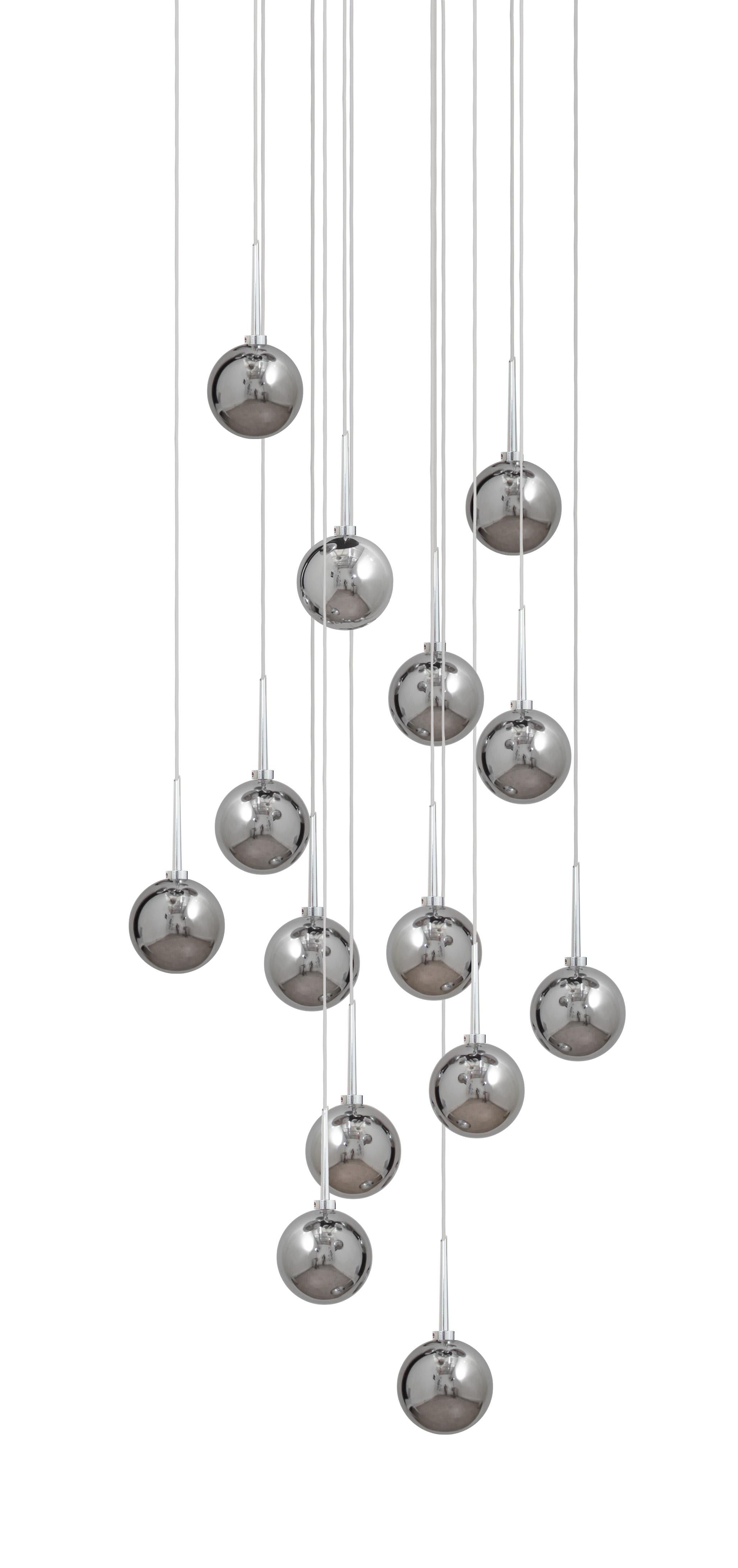 Hand blown glass pendant. 14 glass balls on 42 cm round canopy.

The Sweety pendant light illuminates your space in a soft and warm way. 
The smooth and shiny balls have a diameter of 8 cm, with two finishes you can choose from: copper or