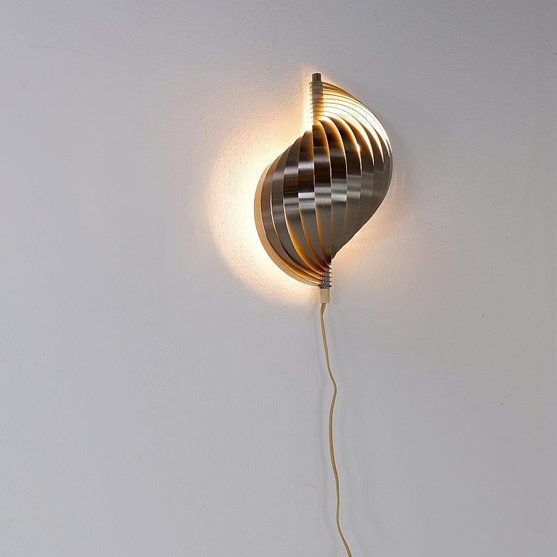 Late 20th Century Swelling aluminium sconce by Henri Mathieu, France, 1970's For Sale