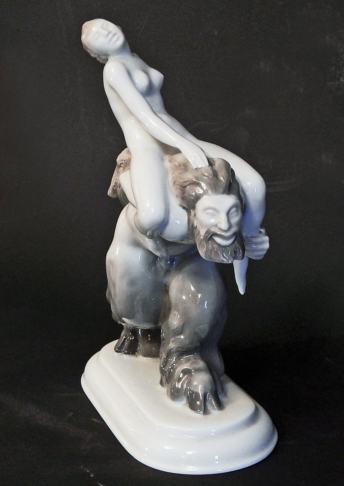 One of the wildest and most sensuous depictions of seduction and wild abandon ever depicted in porcelain, this very fine and rare sculpture was issued by the famous Hutschenreuther porcelain firm, located in Selb, Bavaria. Possibly sculpted by Karl