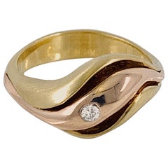 Bracelet contourné « Swirve » en or jaune brossé et rose poli avec diamants