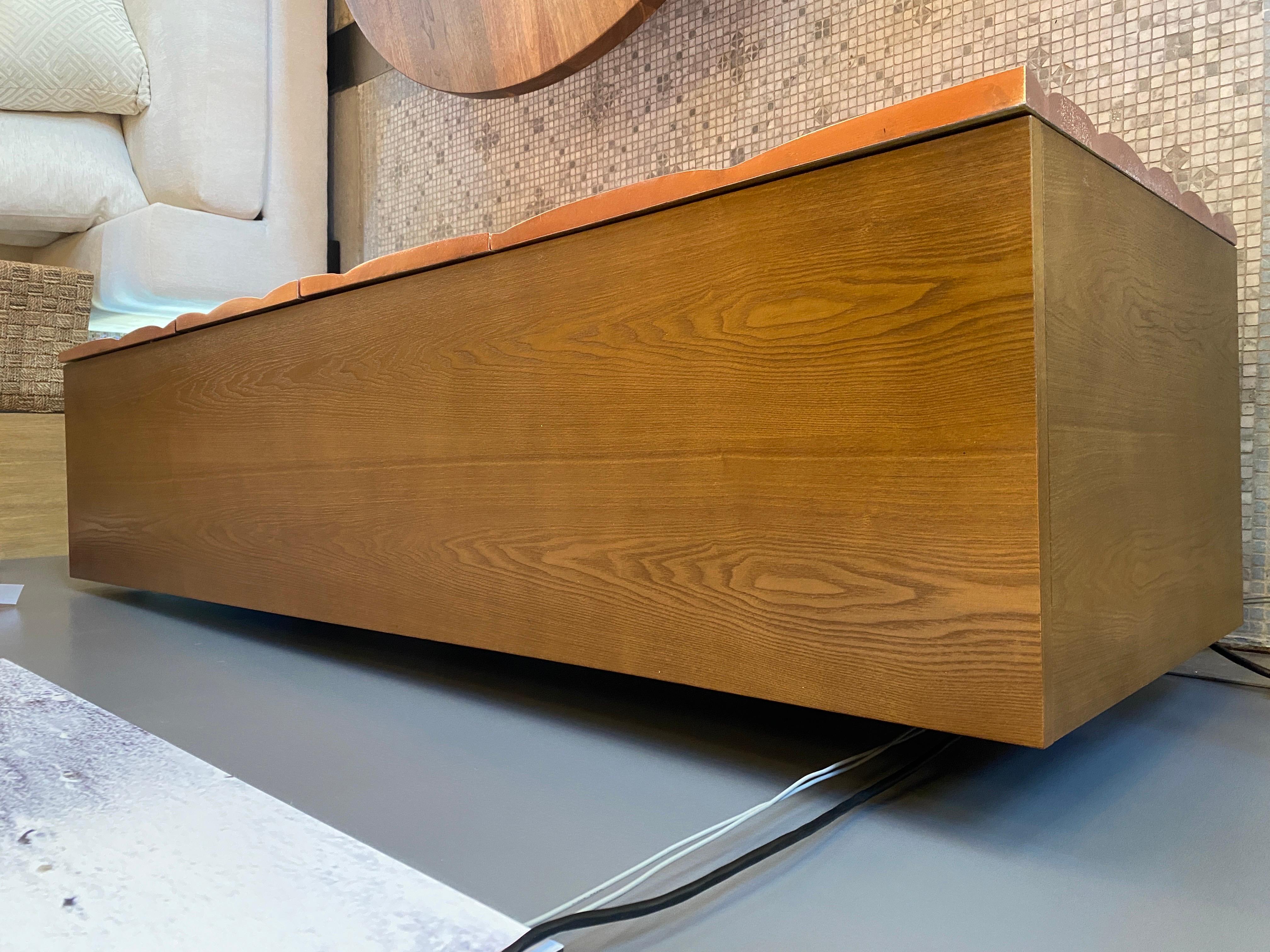 Swerve credenza, beautiful copper color mixed wood. Beautiful craftsmanship!