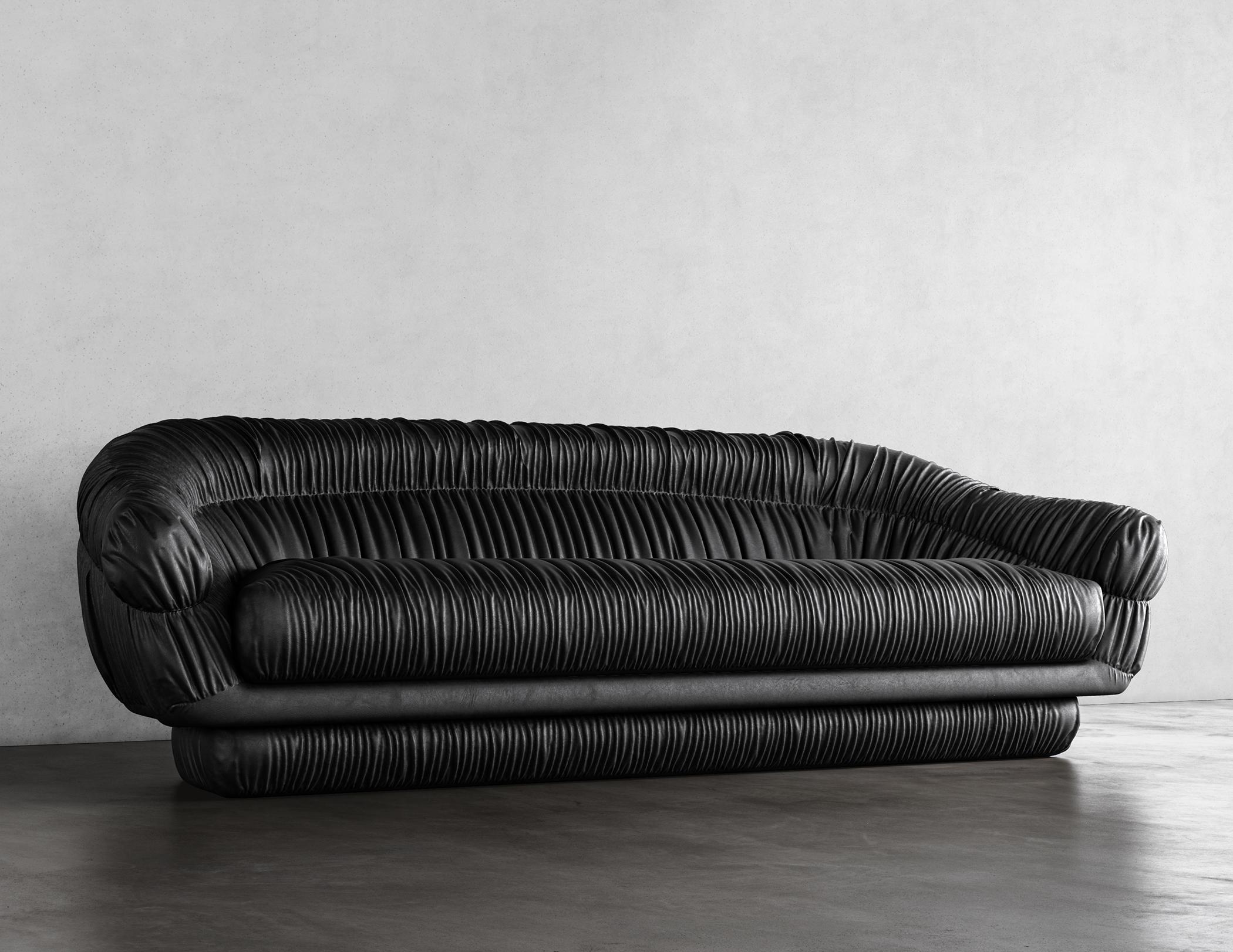 SWERVE SOFA - Modern Sofa in Black Faux Lambskin

The Swerve Sofa with black faux lambskin upholstery and modern ruched design is a stylish and comfortable piece of furniture that will add a touch of elegance to any living space. The sofa features a