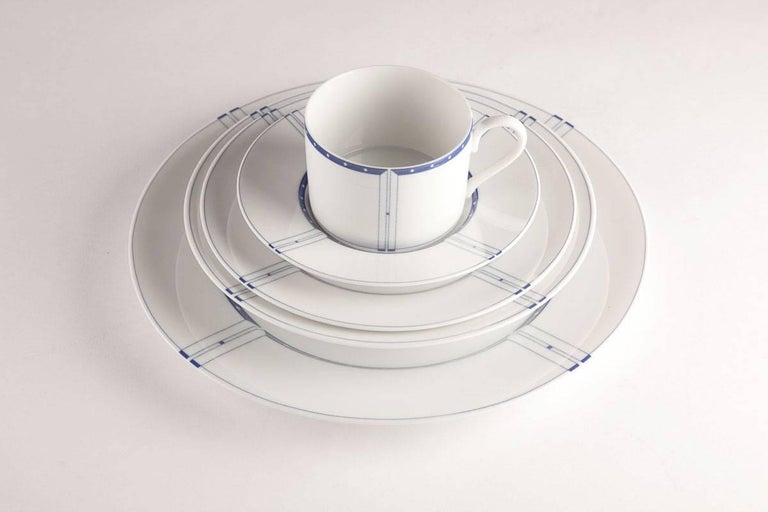Gwathmey & Siegel inspired by Frank Lloyd Wright designed this pattern.
Custom blue five-piece dinner set in original boxes.
Dinner plate, soup bowl, salad plate, cup and saucer.
6 sets total new old stock,
Japan, 1985.
Measures: Dinner plate 11