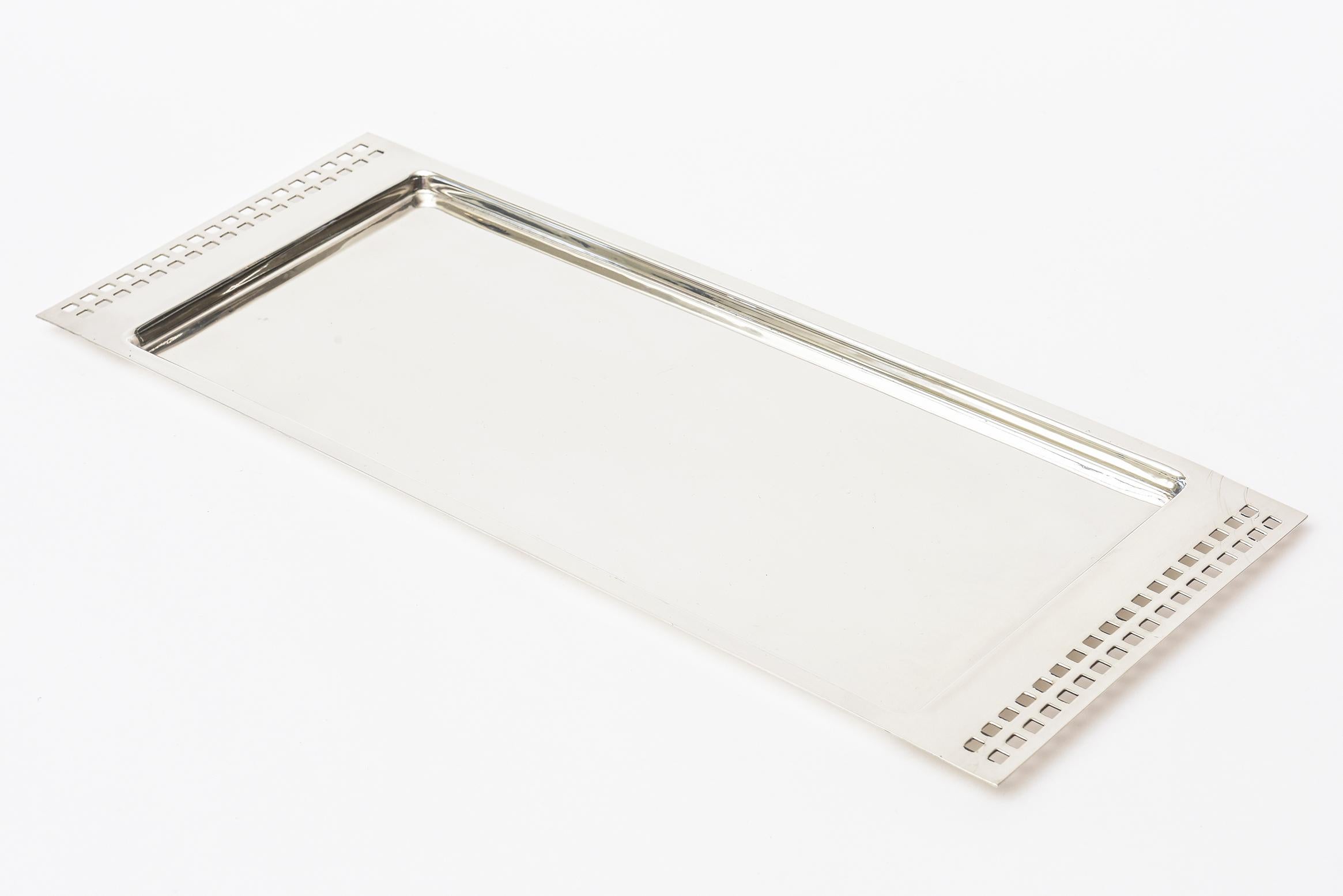 This fabulous elegonated rectangular silver plate tray and or serving tray by an artist for Swid Powell is signed but not terribly legible. It is the skyscraper tray from the 1980s. It is also a great desk accessory and or barware. It is marked on
