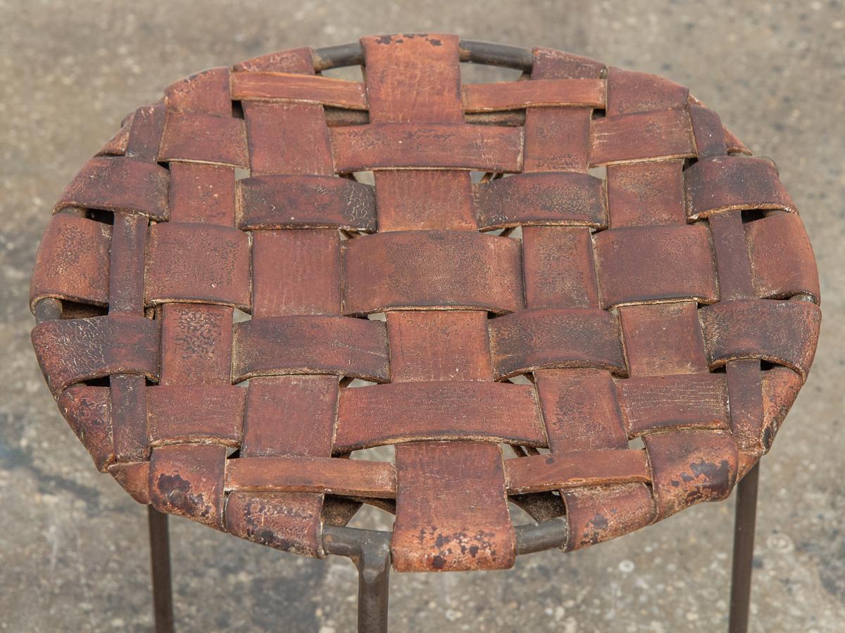 American Swift and Monell Woven Leather Iron Stools For Sale