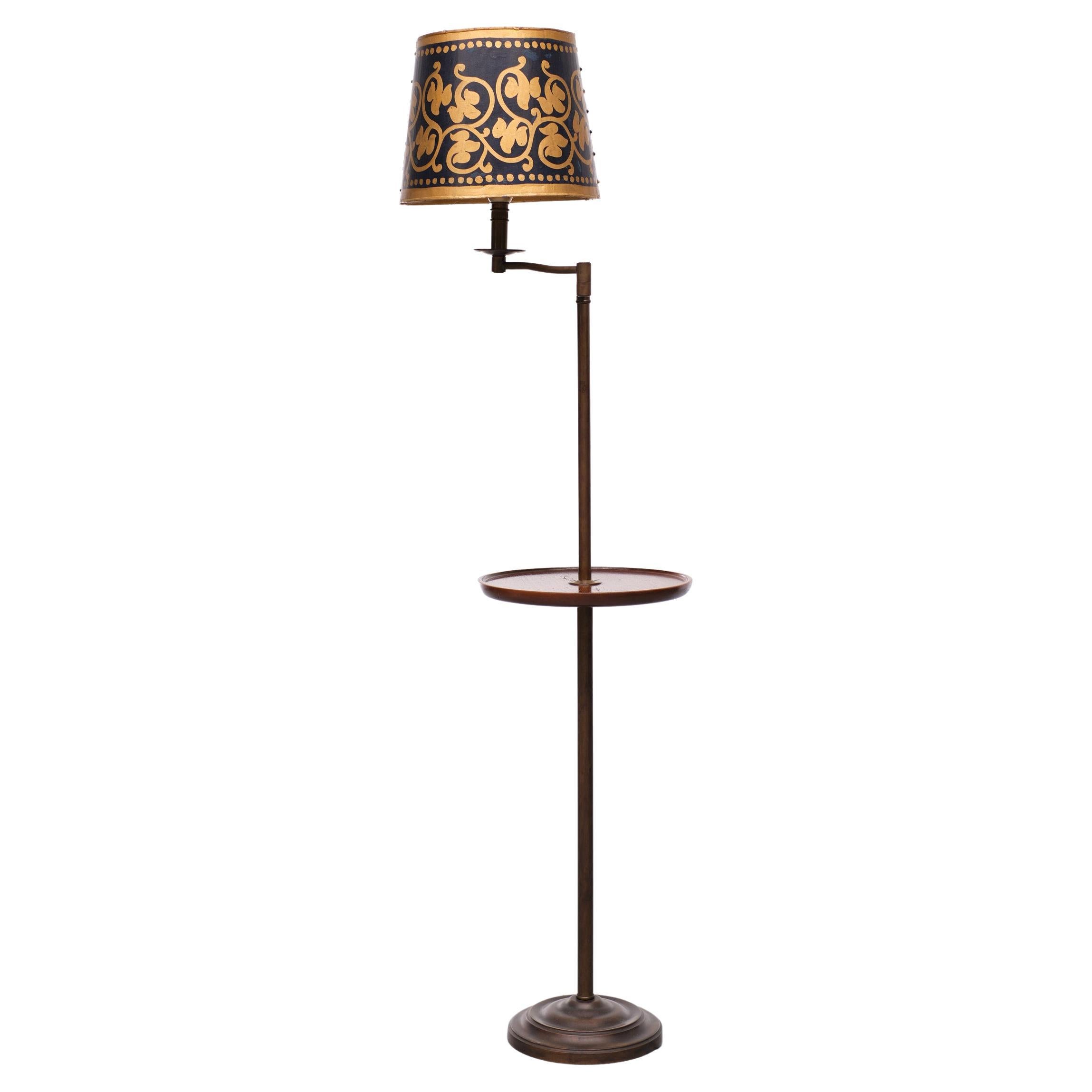 Love this swing arm floor lamp. Antique brass upright, with solid mahogany table. 
Comes with a unique Handmade Iron shade. Hand painted classic floral patron. 
In a dark blue and gold color. One large E27 bulb needed. Floor power switch.
 