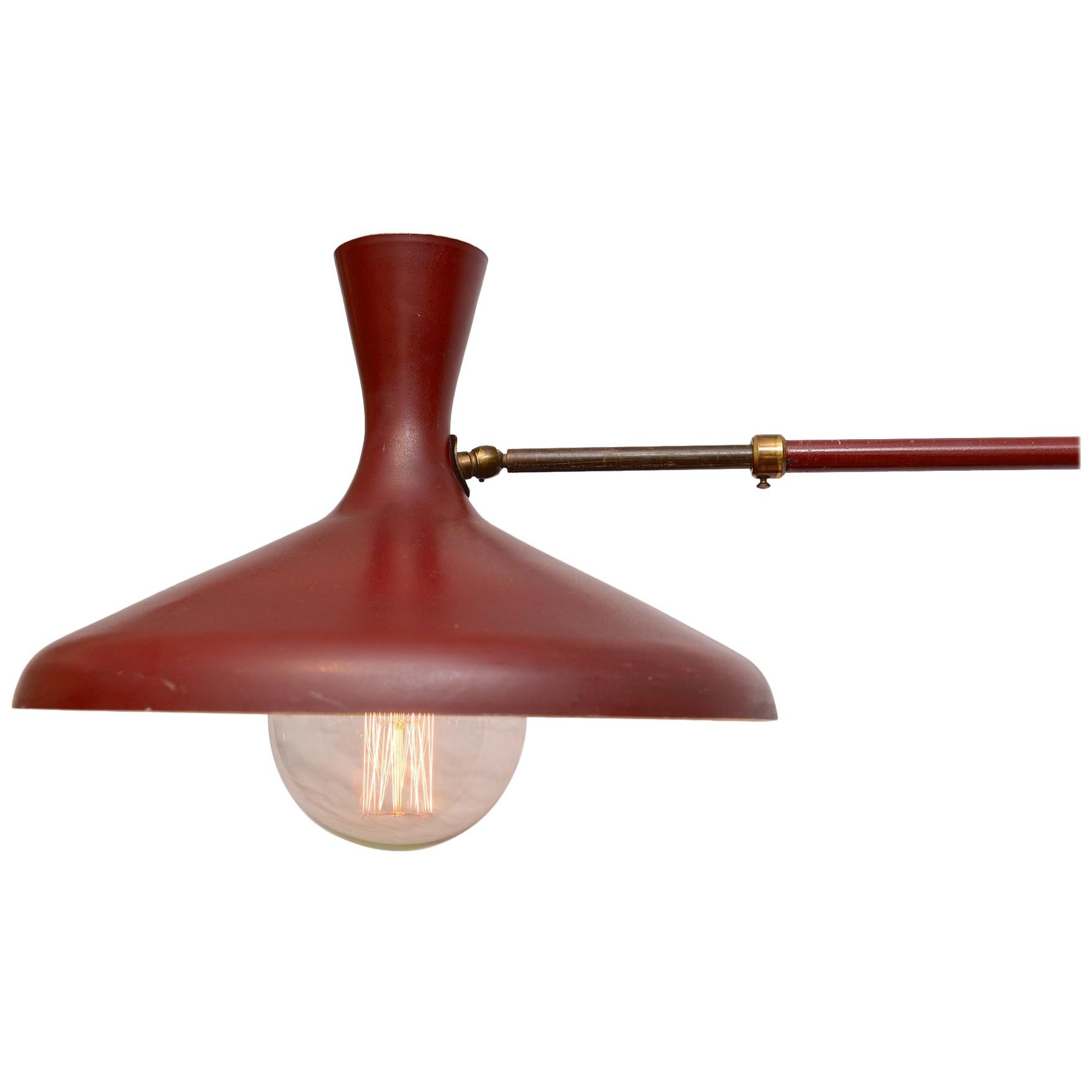 Deep red, mid-century  swing arm wall light

Original paint work in excellent condition

Re wired and PAT tested.