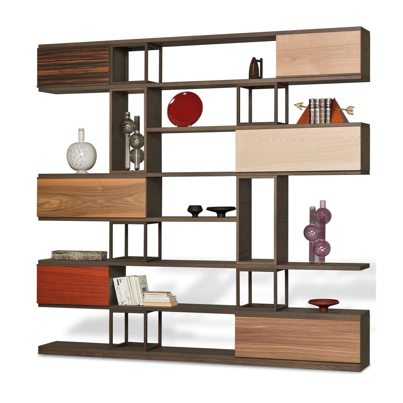 An extraordinary game of lines and perspectives, this bookcase designed by Libero Rutilo merges timeless architectural value with contemporary design. Its distinctive structure is handmade of ash wood, boasting open and closed compartments, the