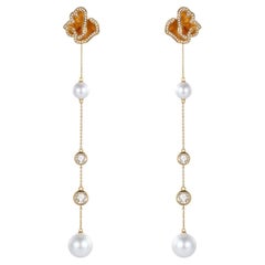 Quintessence Boucles d'oreilles en perles Swing