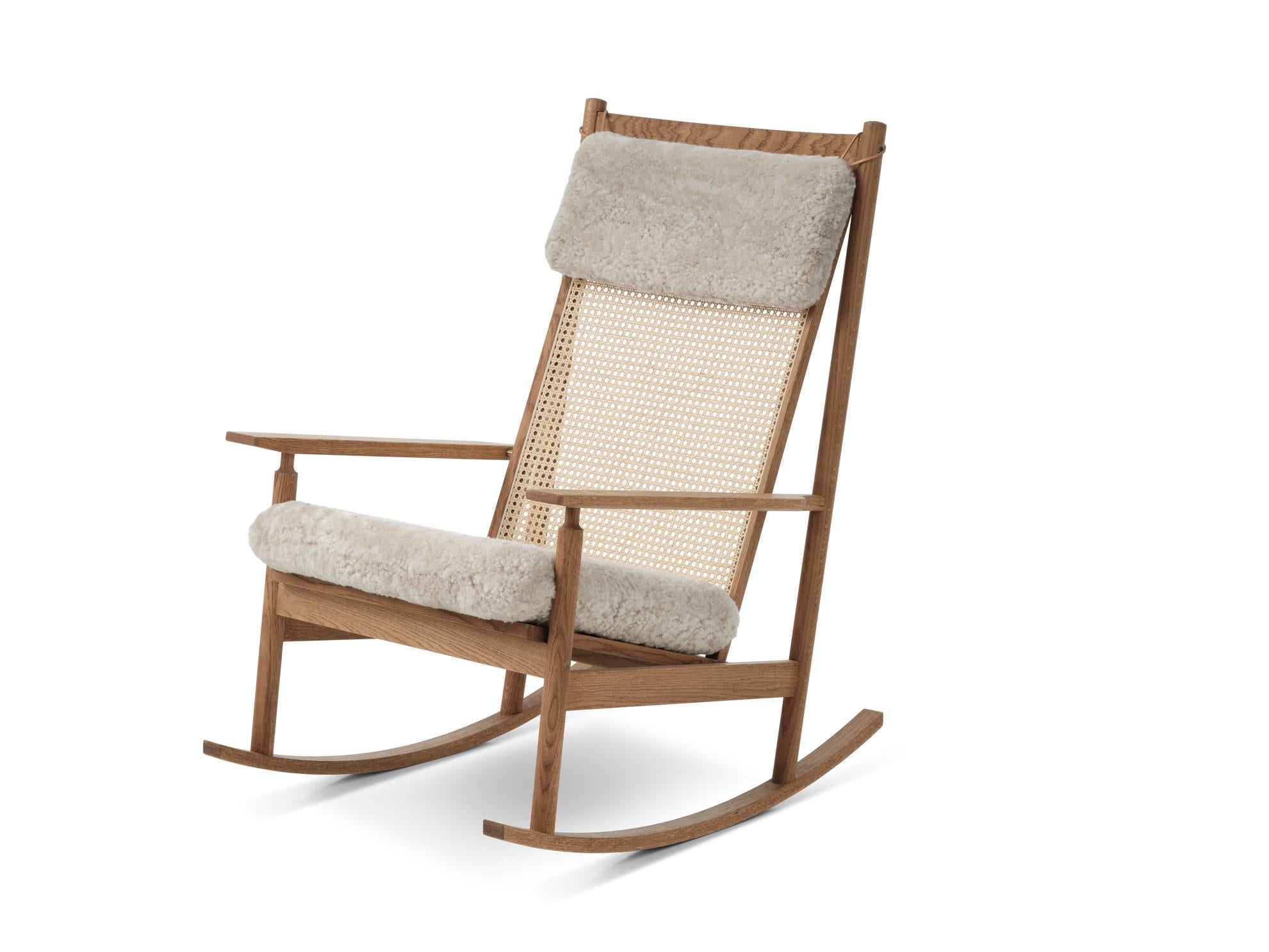 Swing rocking chair sheepskin moonlight by Warm Nordic
Dimensions: D91 x W68 x H 103 cm
Material: Wood, Foam, Rubber springs, French cane, Textile or leather upholstery, Teak, Sheepskin upholstery
Weight: 16.5 kg
Also available in different