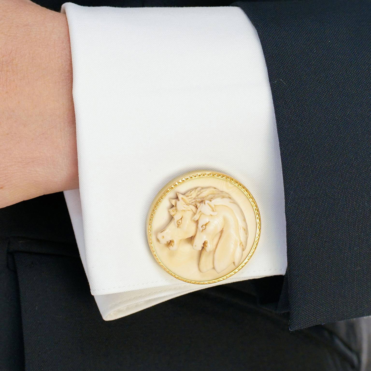 Circa 1960s, 14k, American. Decorated with what are clearly Japanese warhorses, these 14k gold cufflinks combine our fascination with all things Japanese with all things equine. Fabulously oversized with beautiful bone carvings, they are well-made