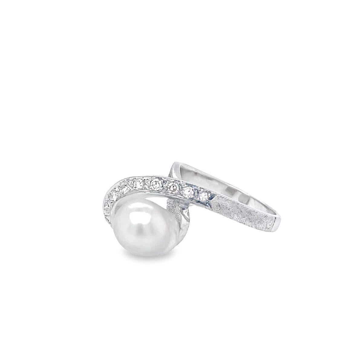 Captivating and lustrous, this Baroque Akoya Pearl Ring will take your breath away. 
Vintage ring is shown in 14K white gold set with one baroque akoya pearl of 9mm in diameter and  containing 11 diamonds weighing approx. 0.33 carats of diamond