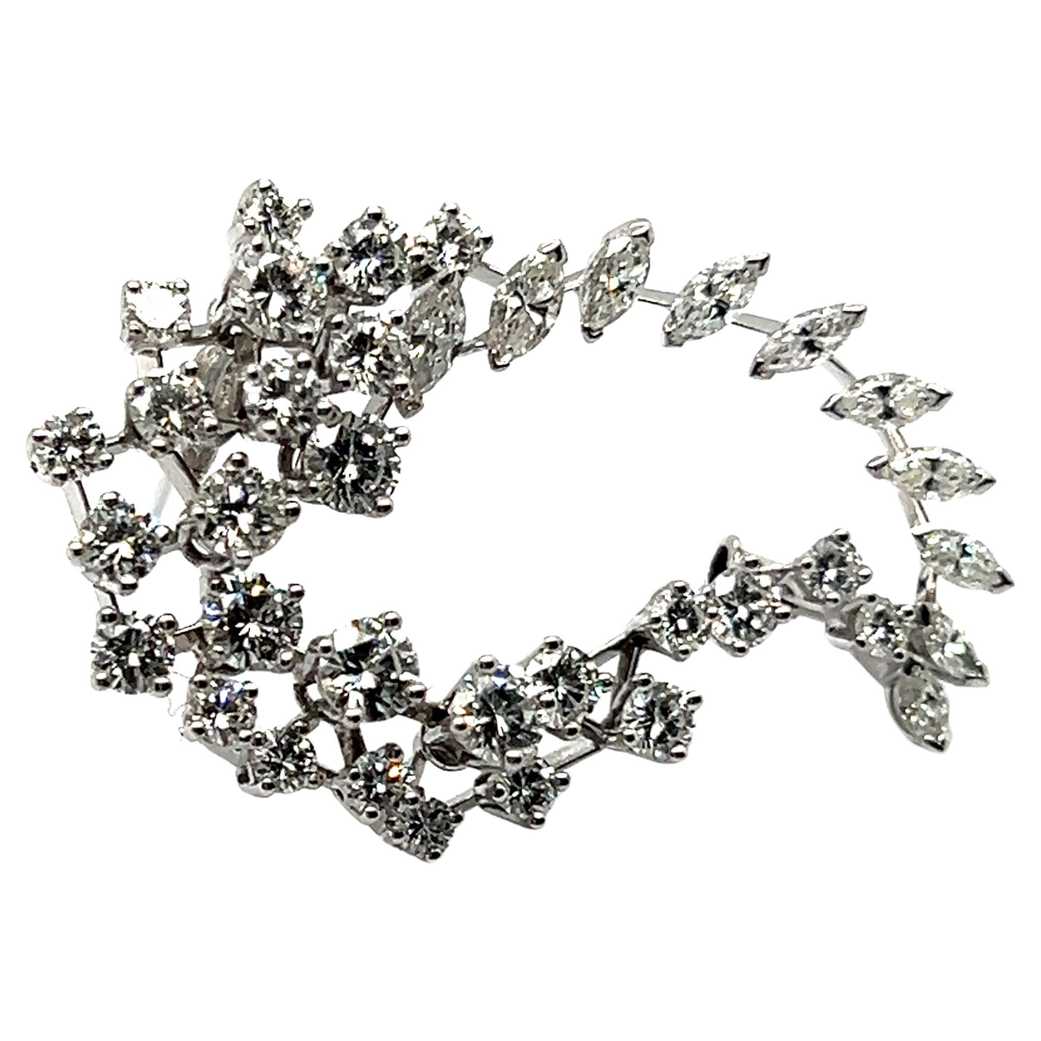 Broche Remolino de Diamantes en Oro Blanco de 18 Kilates
