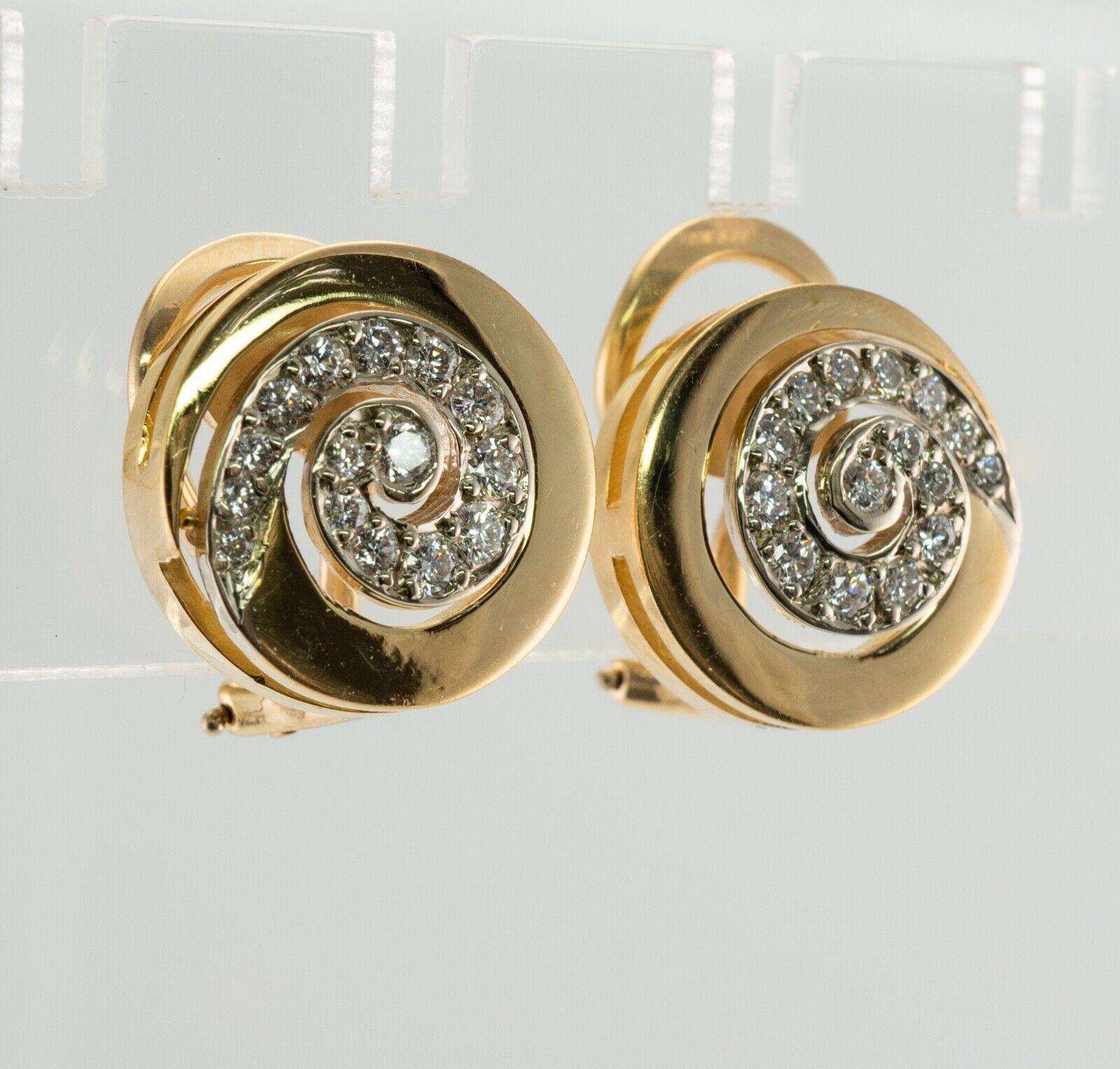 Swirl Spiral Diamond Earrings Ivan & Co Clips 18K Gold
 
These designer earrings are made by Ivan & Co.
Solid 18K Yellow Gold
Each earring is set with 15 round cut diamonds of VVS2 clarity and H color.
The total diamond weight for the pair is .90
