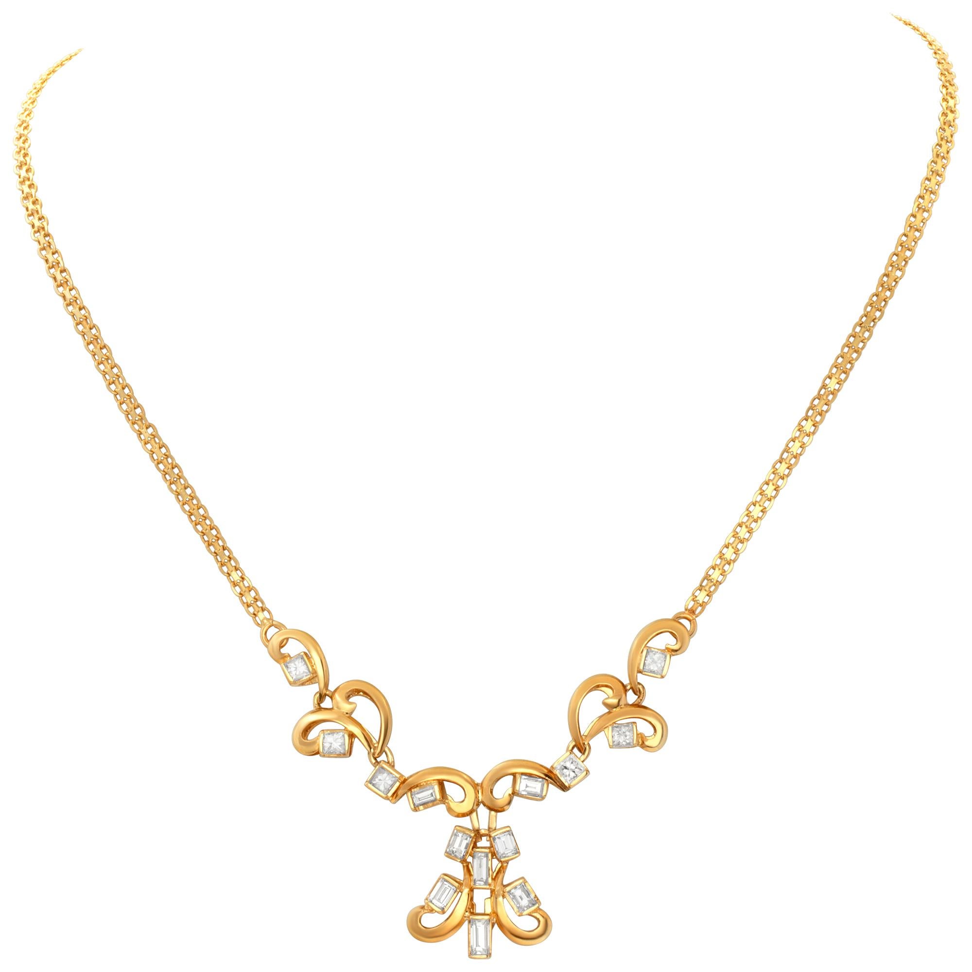 Collier en or jaune 18 carats avec plus de 2 carats de diamants princesse et baguette de couleur G-H et de pureté VS. Longueur 20 cm.