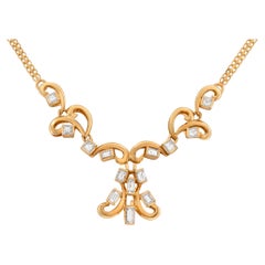 Vintage Swirl diamond necklace in 18k yellow gold with over 2 carats