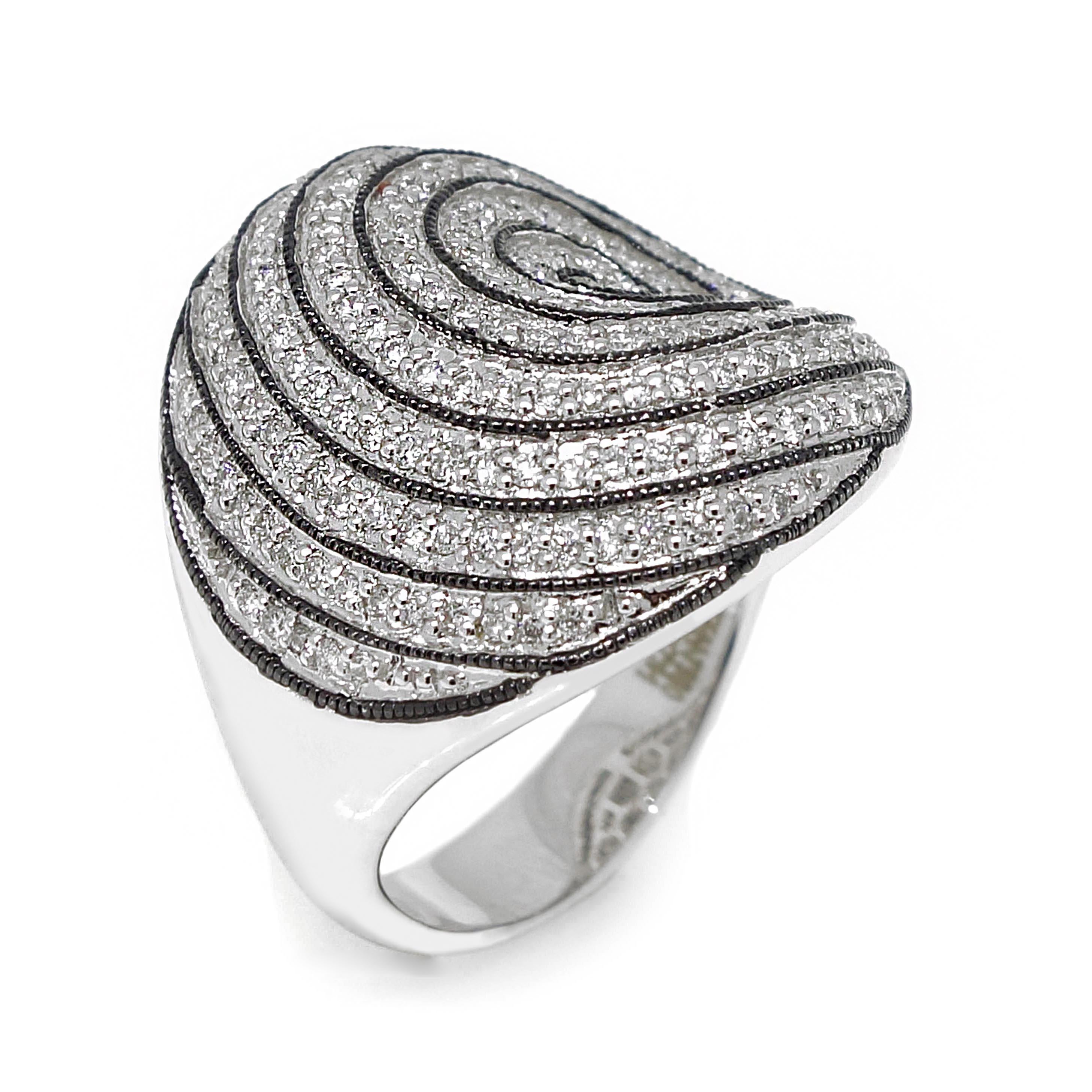 Swirl Diamond ring containing 184 round brilliant cut diamonds of about 0.71 carats with a clarity of SI and color G. All diamonds are set in 18k white gold with a touch of black rhodium accentuate the swirl from the center to the outer side of the