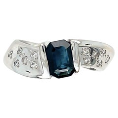 Emerald Cut Sapphire and Diamond Swirl Ring 14k White Gold