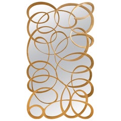 Miroir Swirl Gold en bois d'acajou massif