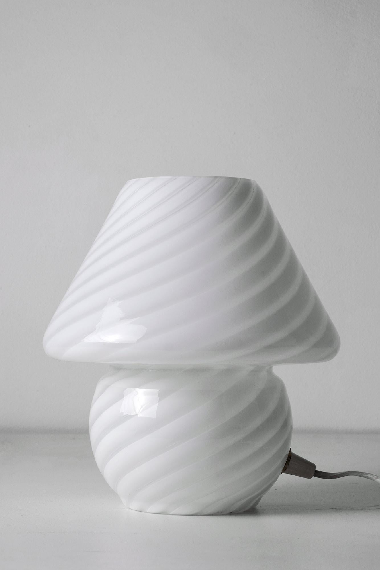 Splendid swirl Murano glass table lamp. 
Made of hand blown cased glass. 
Original label “Vetri VM Murano