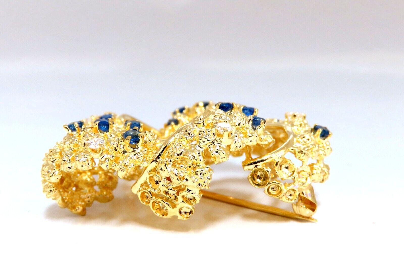 Swirling 3D Crest Pin

Very Well Made



.50ct natural diamonds

G-color Vs2 Clarity

.80ct natural sapphire

1.8 x 1.6 inch 

Handmade 

18kt. yellow gold 

30 Grams.

$8000 Appraisal to accompany