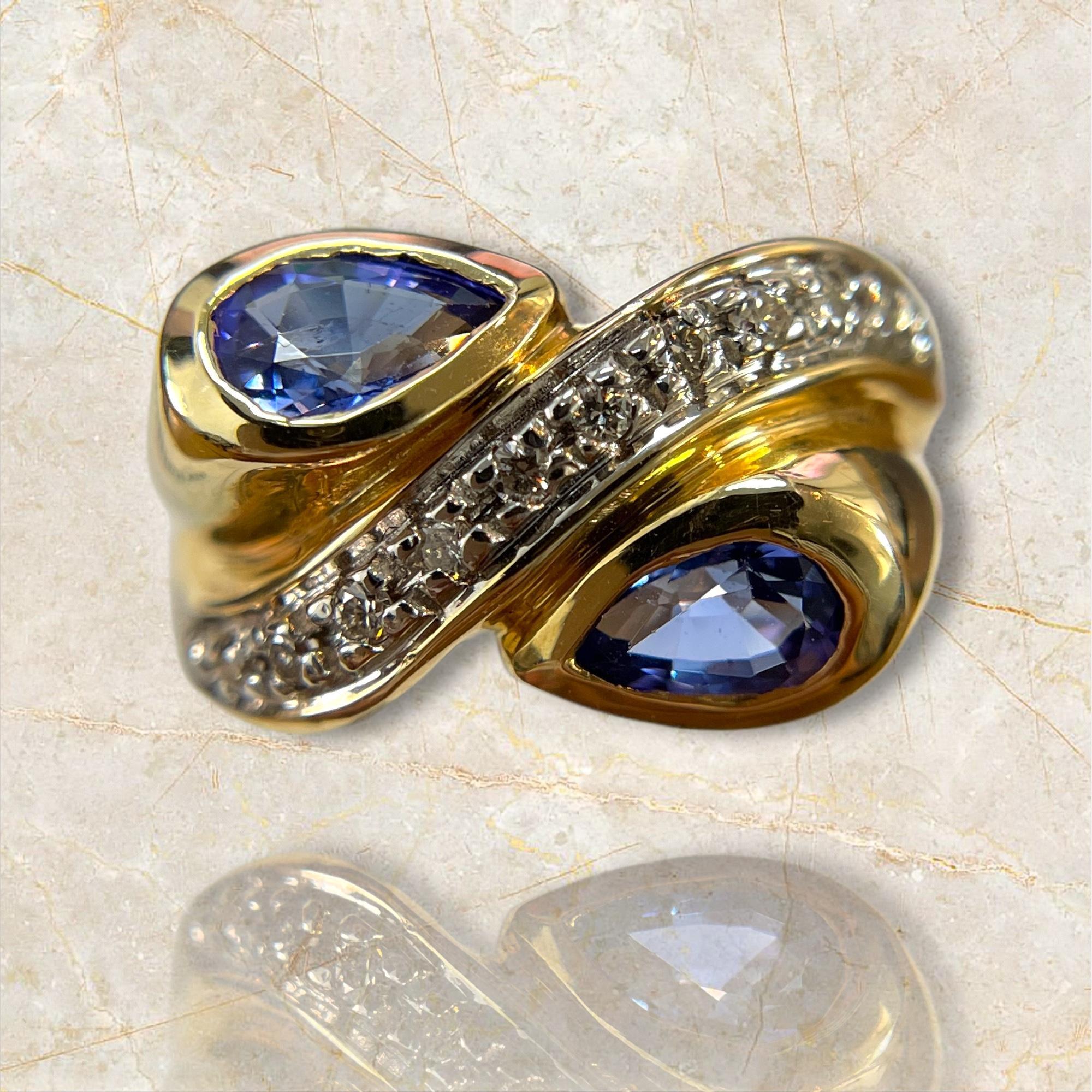 Pear Cut Swirling Beauty: 14K Yellow Gold Pear-Shaped Tanzanite and Diamond Ring For Sale