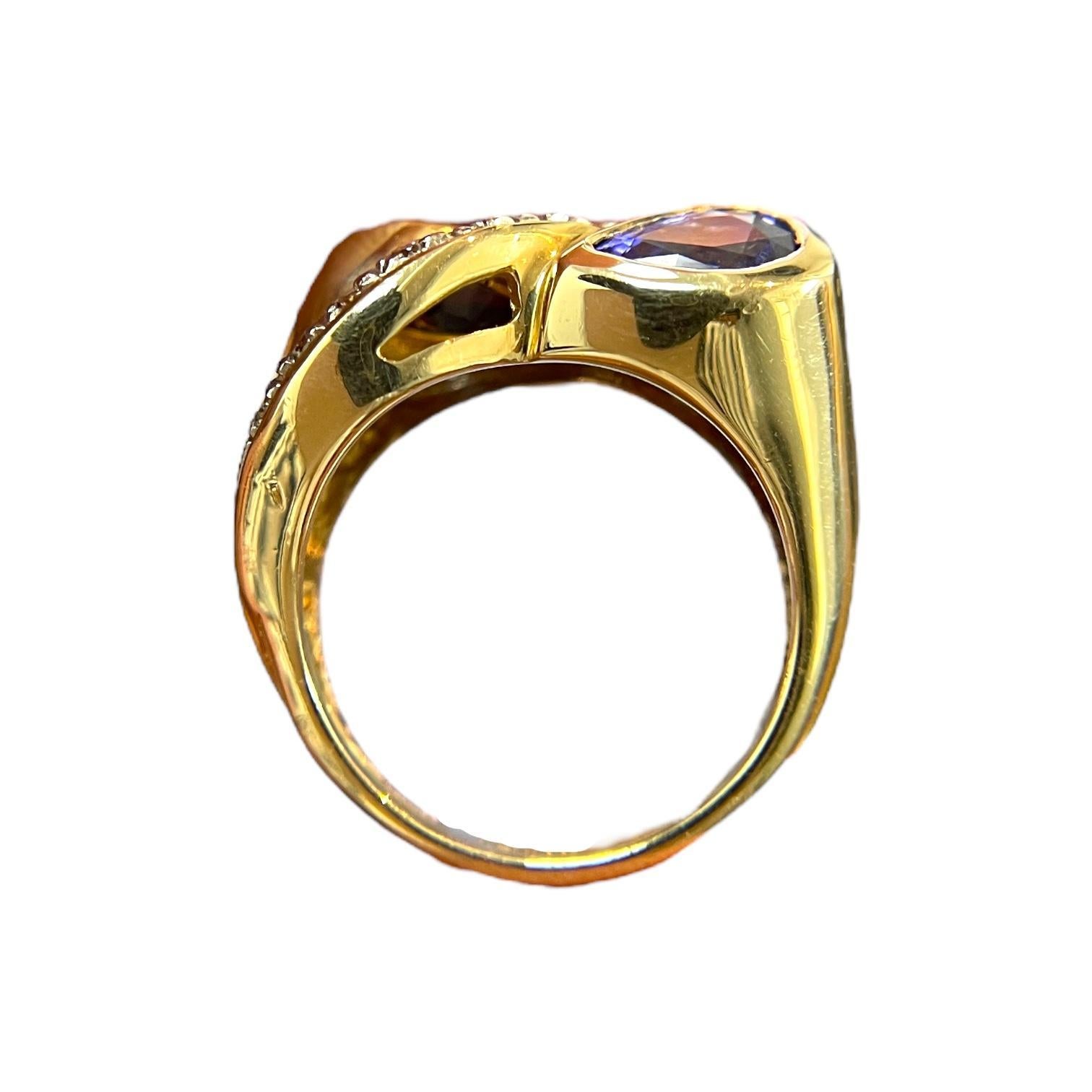 Swirling Beauty: 14K Yellow Gold Pear-Shaped Tanzanite and Diamond Ring For Sale 1