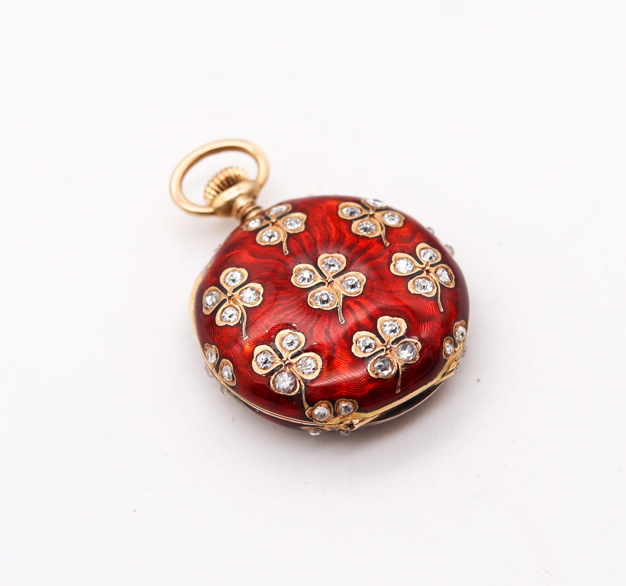An Edwardian Guilloché enameled pendant-clock.

A beautiful and finely detailed pendant-watch created in Switzerland, back in the 1895. The pendant watch has been crafted with Edwardian motifs in solid yellow gold of 14 karats and fully decorated
