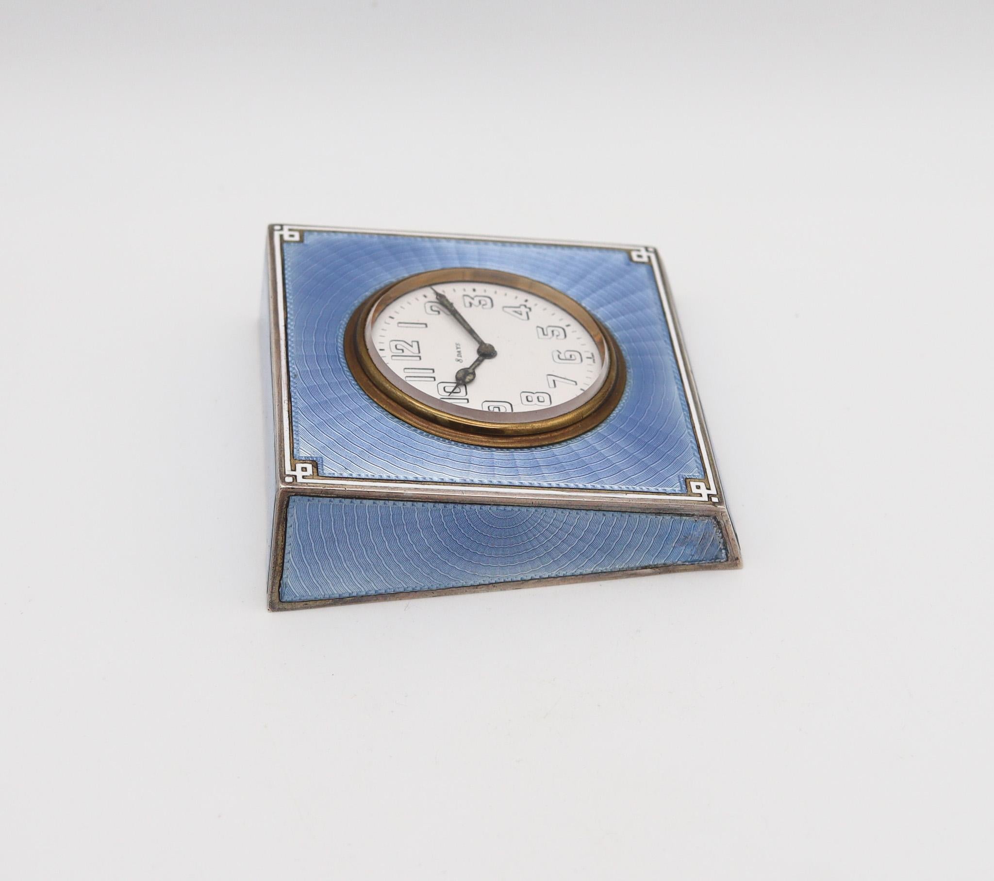 An art deco desk clock with blue enamel.

This is an exceptional desk clock, made in Switzerland during the art deco period, around the 1915. The craftsmanship of this beautiful desk clock is exceptional and was designed with geometric patterns. The