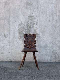 Swiss alp escabelle with a sculpted backrest