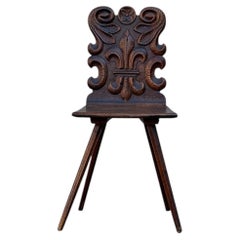 Swiss alp escabelle with a sculpted backrest