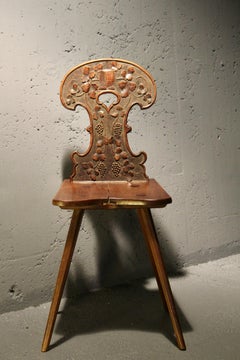 Swiss alp escabelle with decorative sculpture