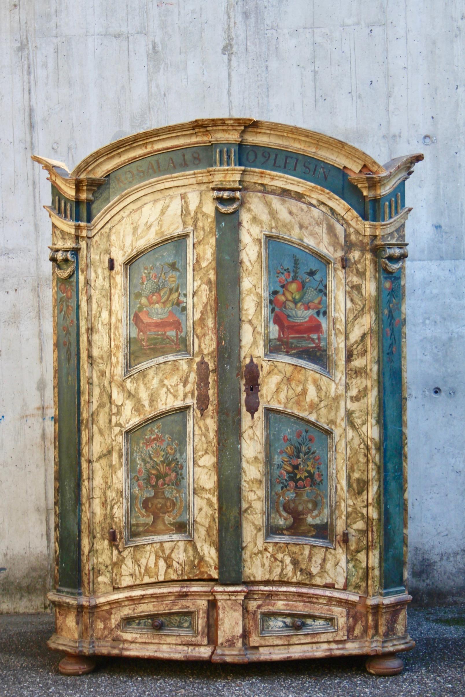 Swiss alp painted cupboard dated 1809 Rosalia Leisin with a very beautiful lock probably from the 18th century, there are two drawers at the bottom, in the center and a small drawer inside, the paint imitates marble and vases of flowers.