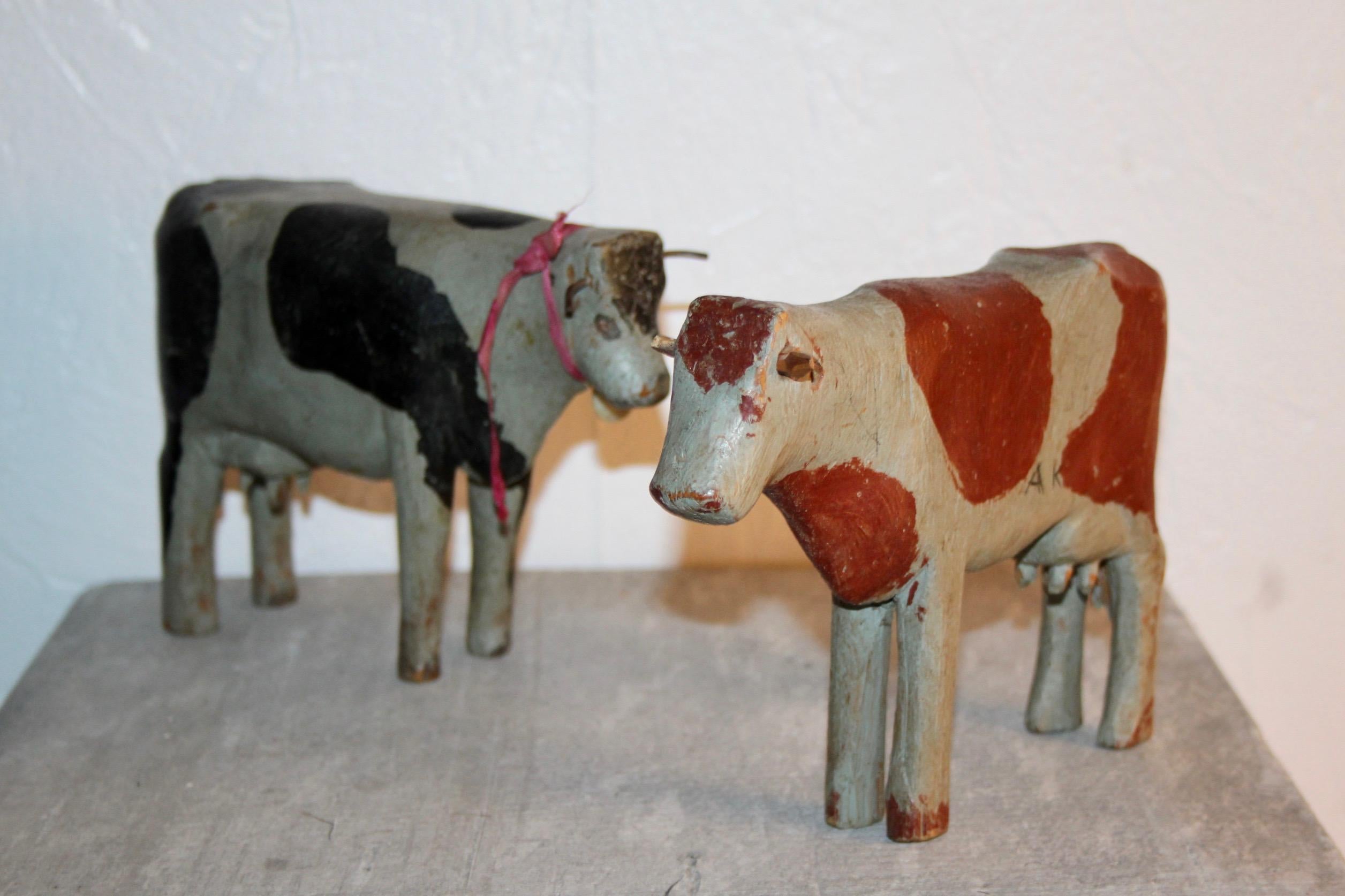 Mid-20th Century Swiss alp wood cows toys circa 1930
