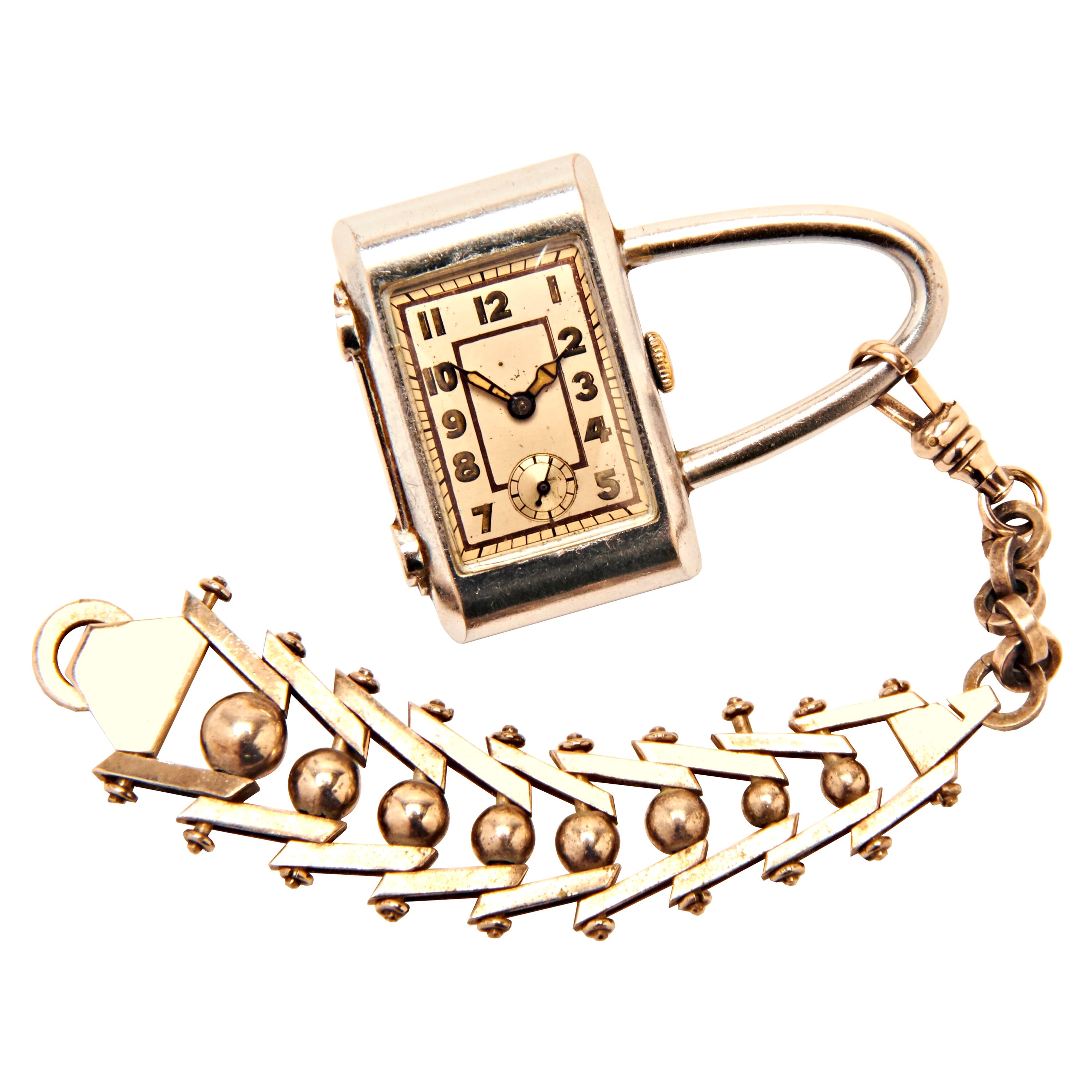 Swiss Art Deco/Machine Age Polished Steel Purse Watch with Chevron 
Ball Fob For Sale